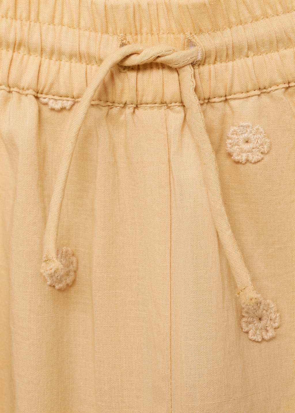 Long pants with embroidered details