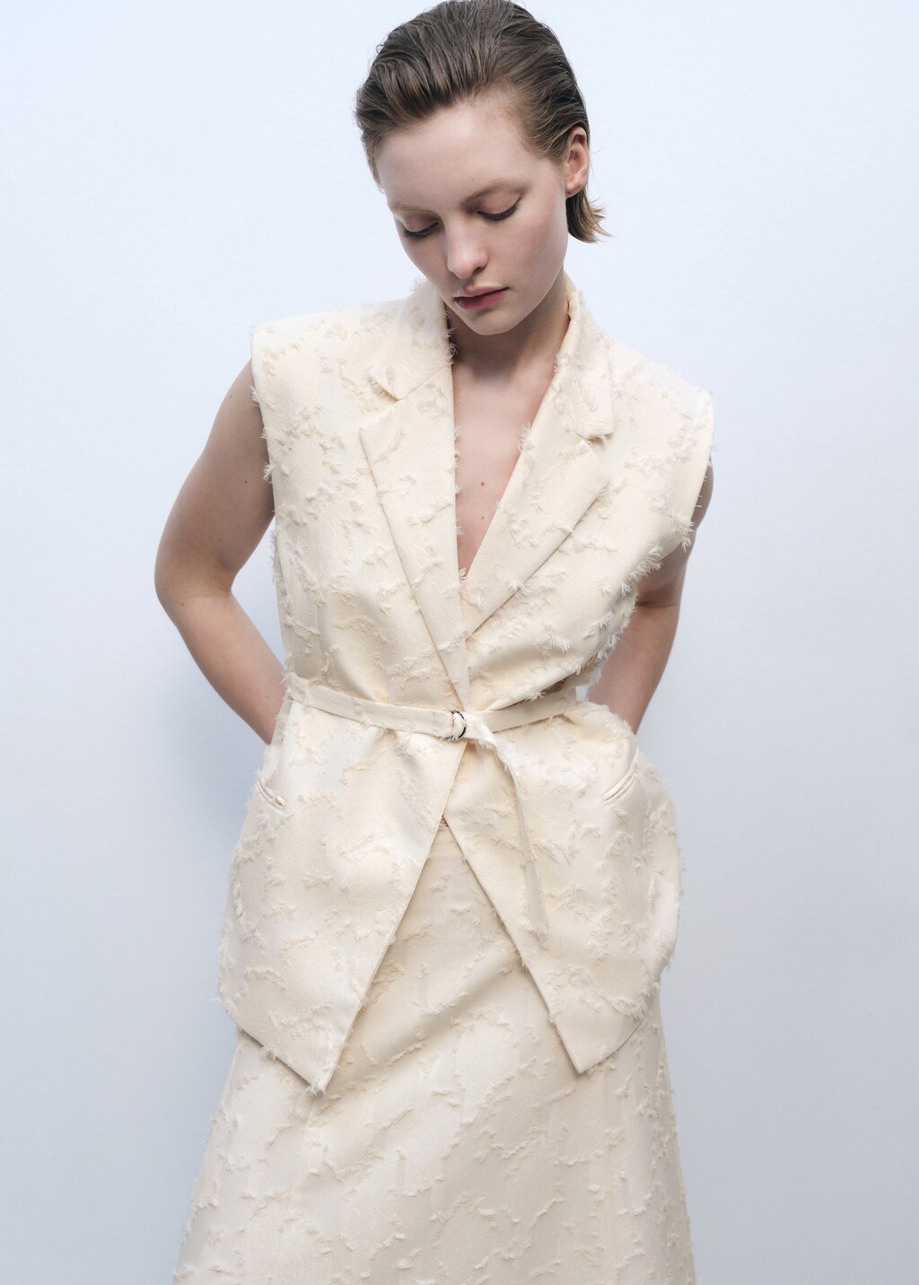 Textured vest with belt