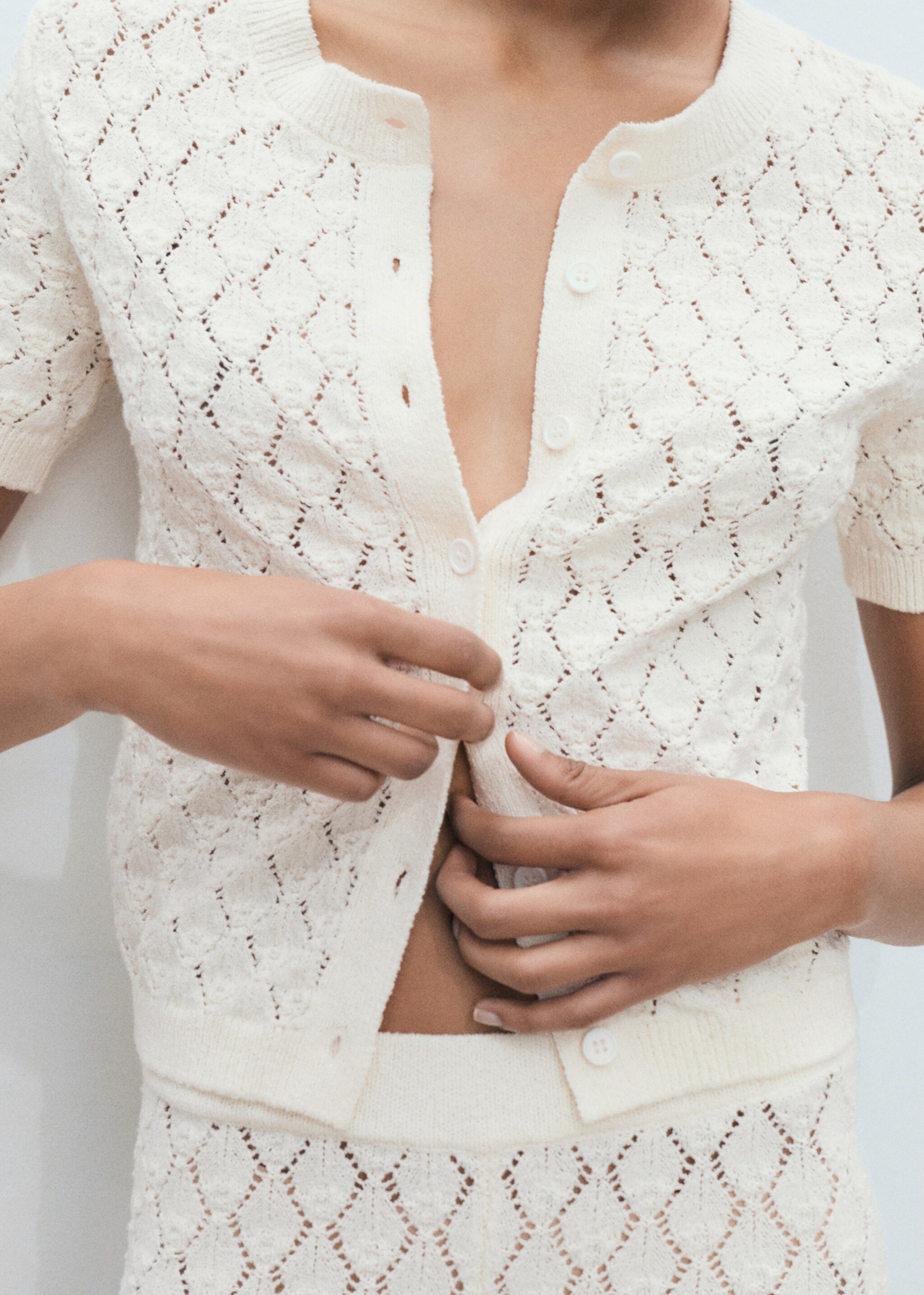 Short-sleeved openwork knitted cardigan - Details of the article 6