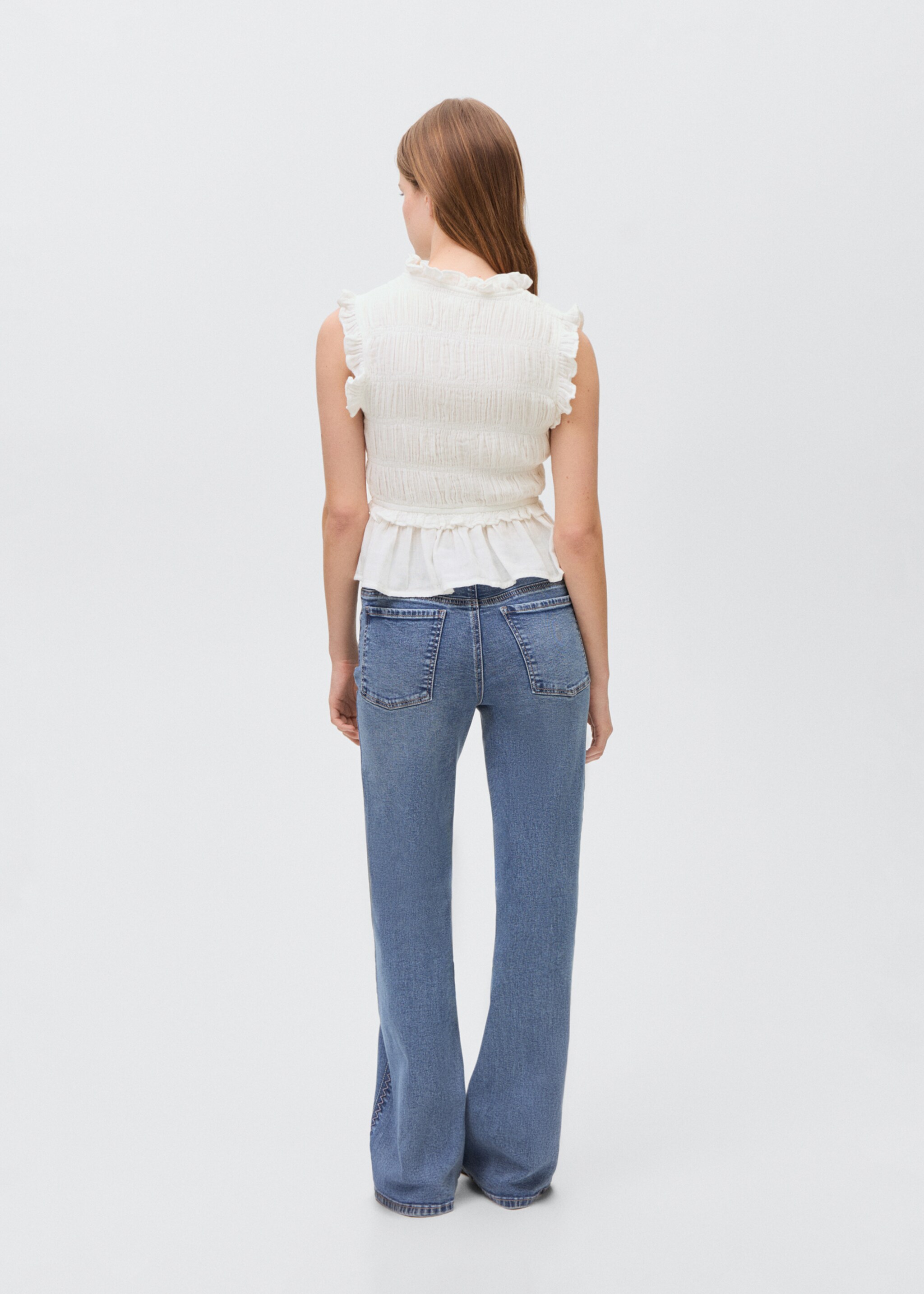 Blusa fruncida volante - Reverso del artículo