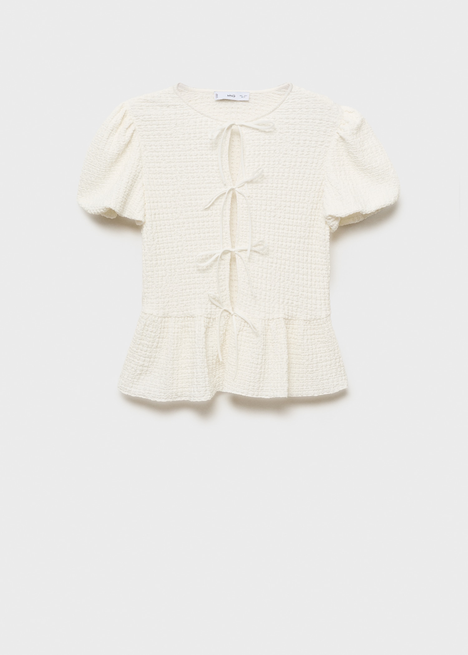 Textured blouse with bow closure - Article without model