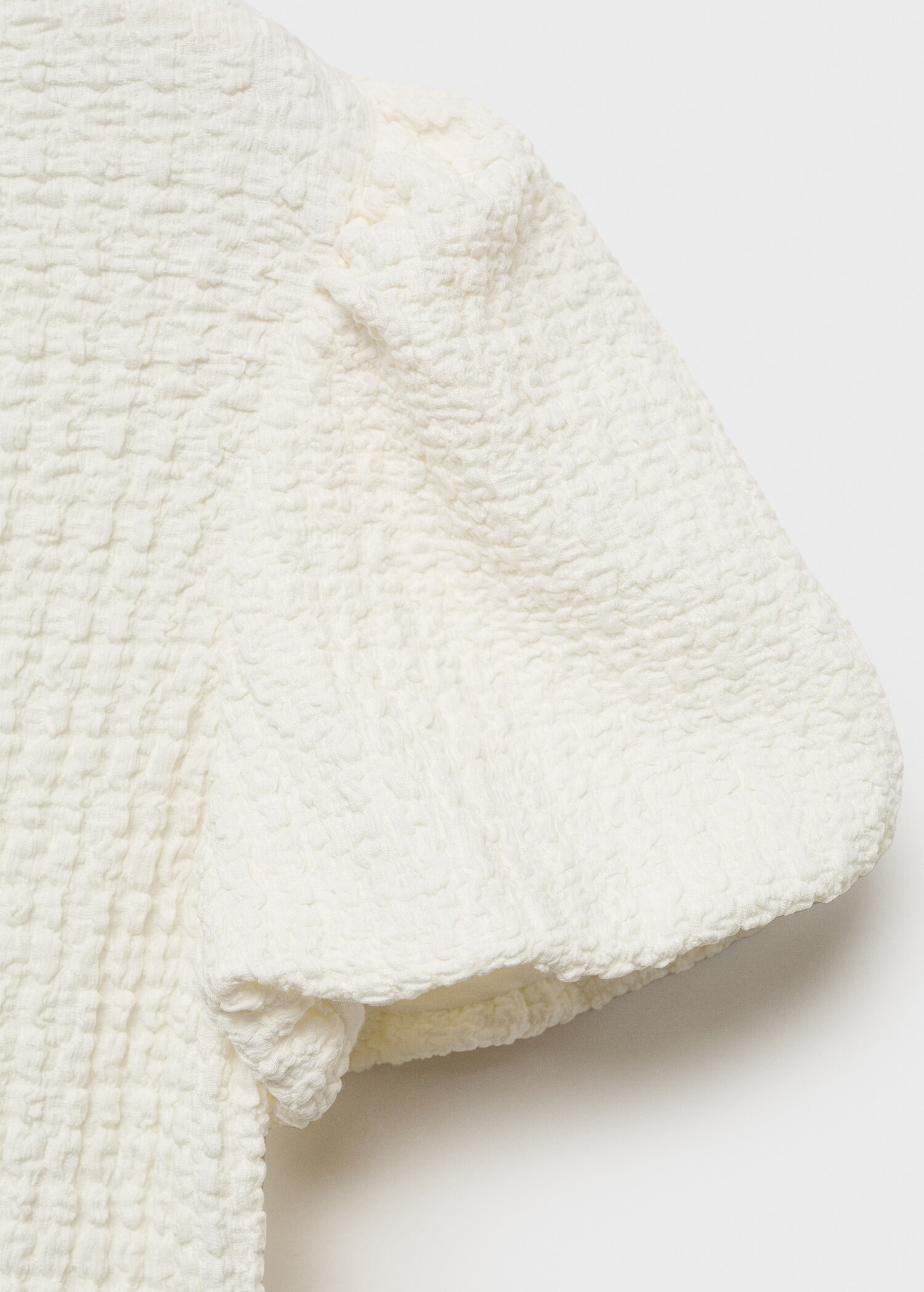 Textured blouse with bow closure - Details of the article 0