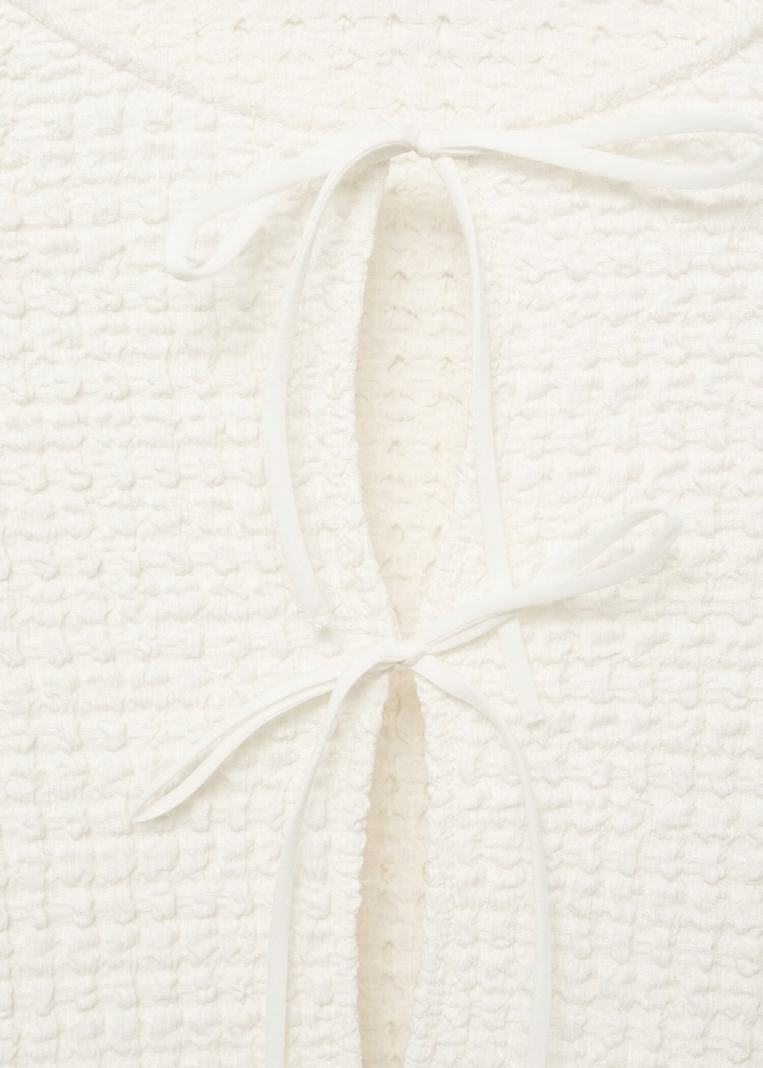 Textured blouse with bow closure - Details of the article 8