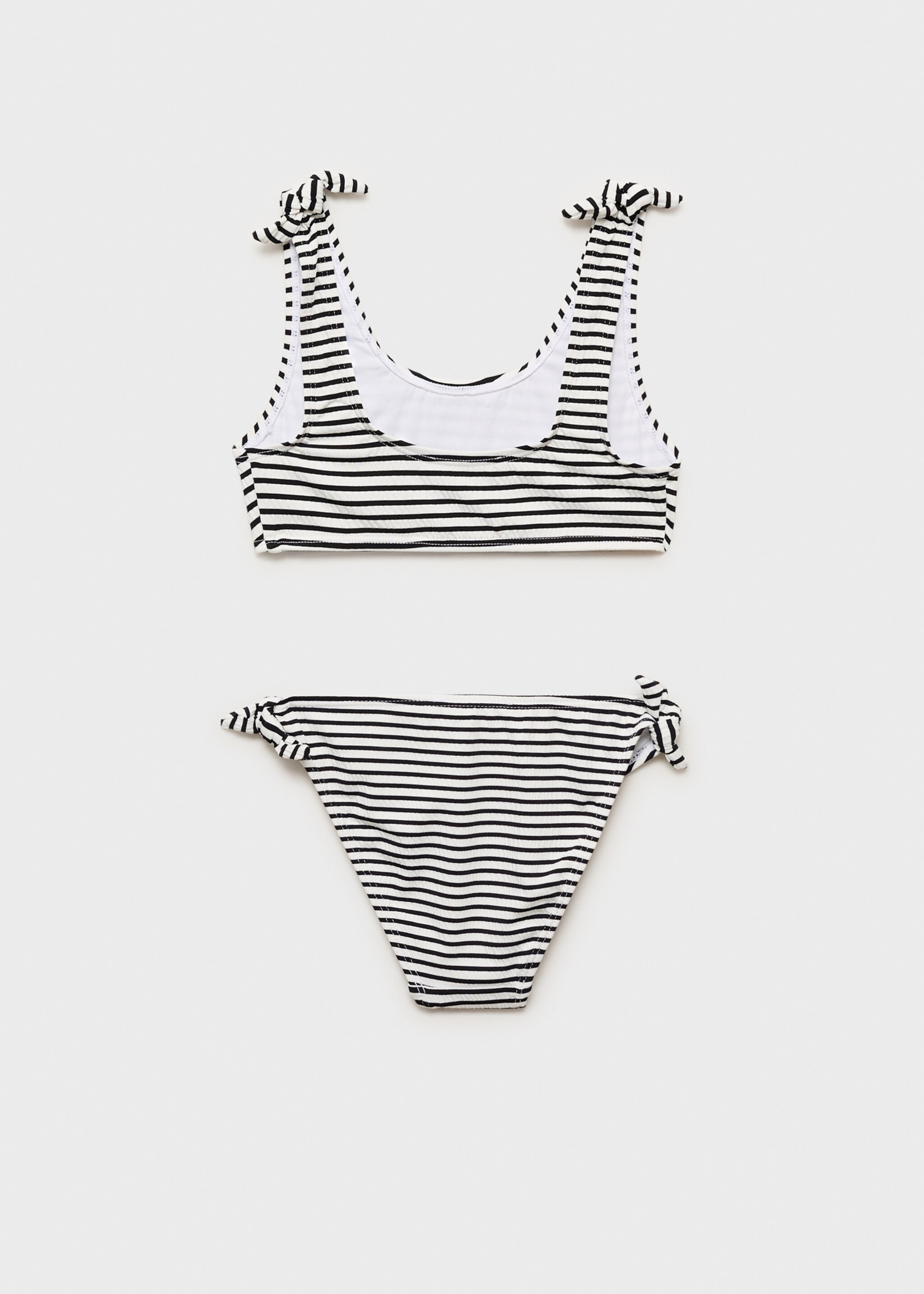 Striped bikini - Reverse of the article