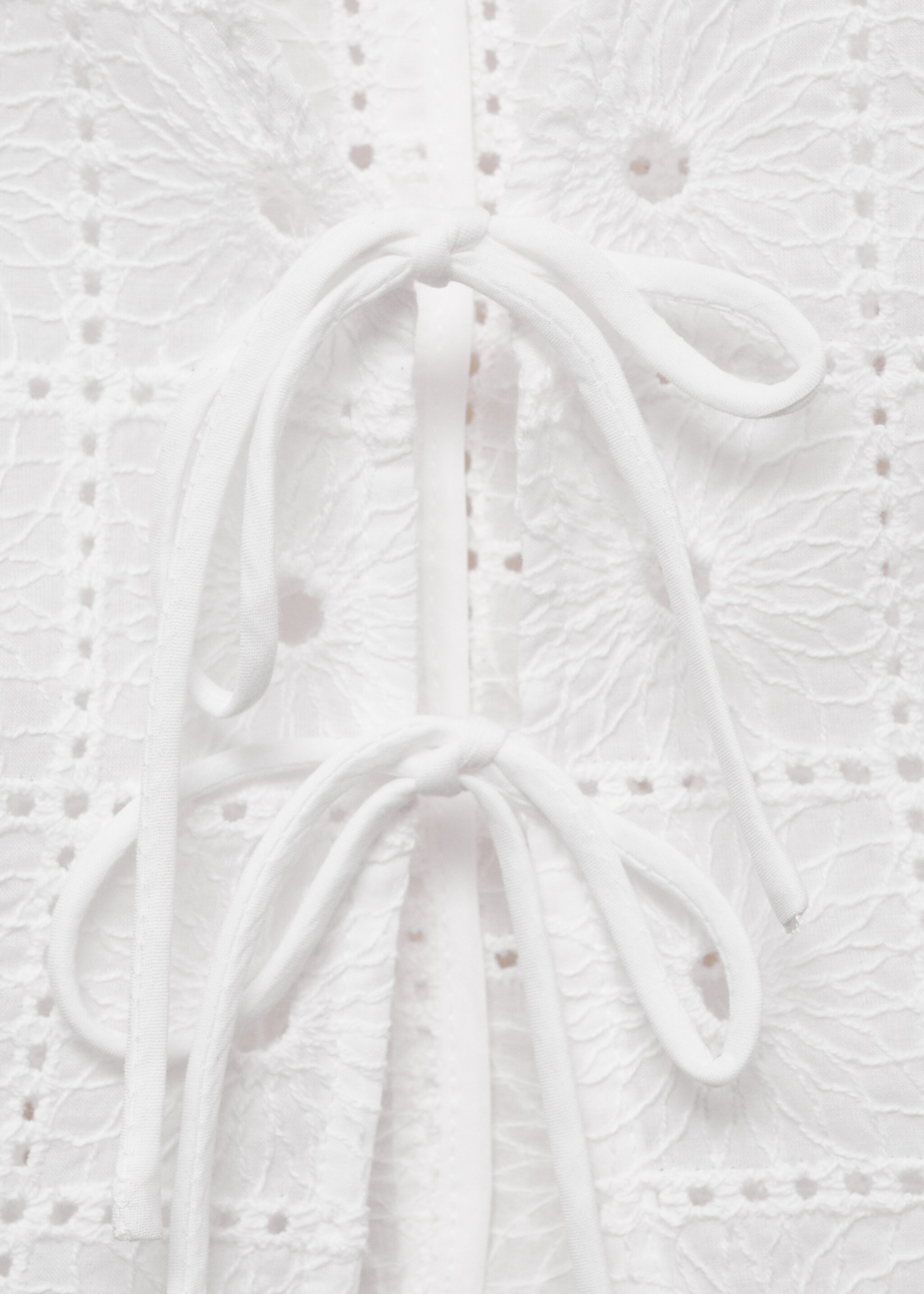 Embroidered cotton waistcoat with bows - Details of the article 8