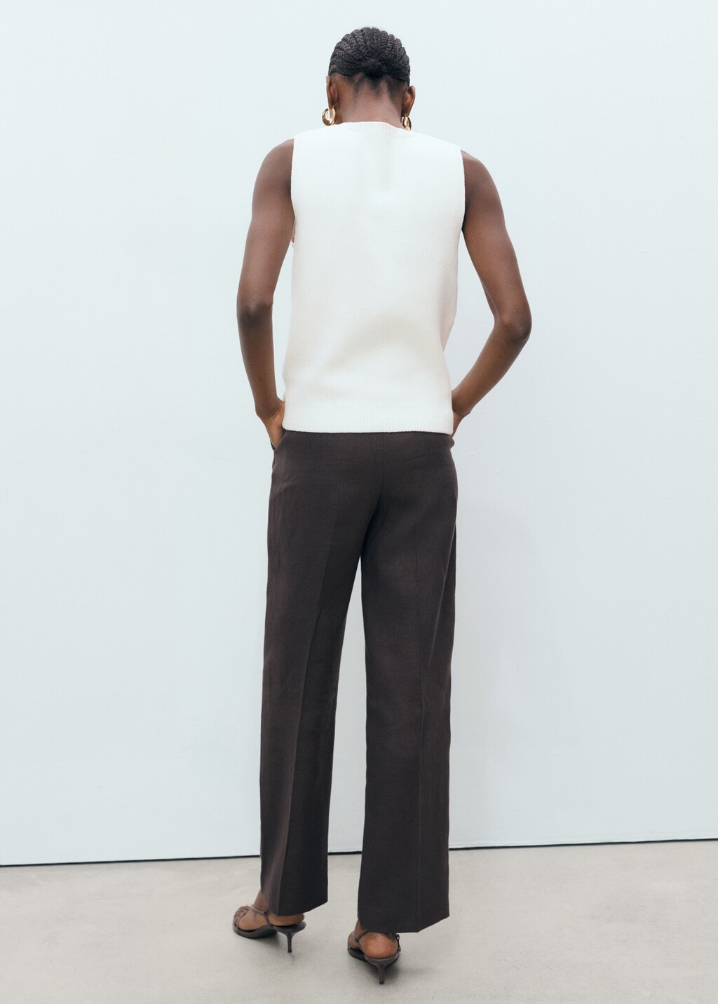 Knitted top with jewel buttons - Women | MANGO USA