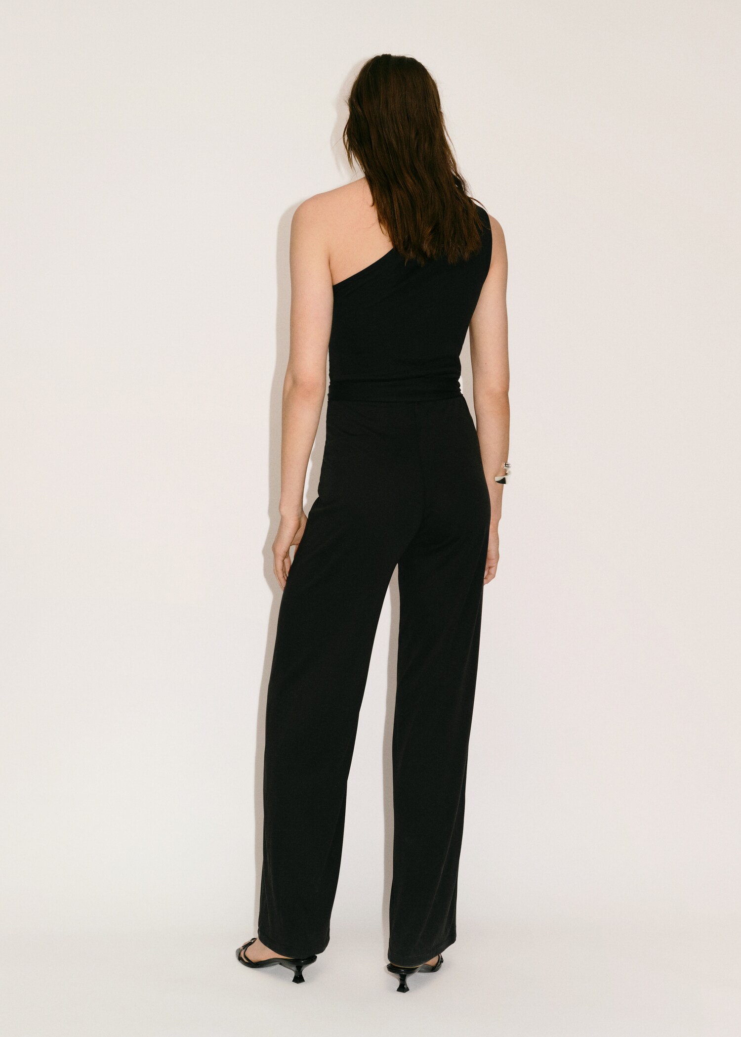 Asymmetric belt jumpsuit - Reverse of the article