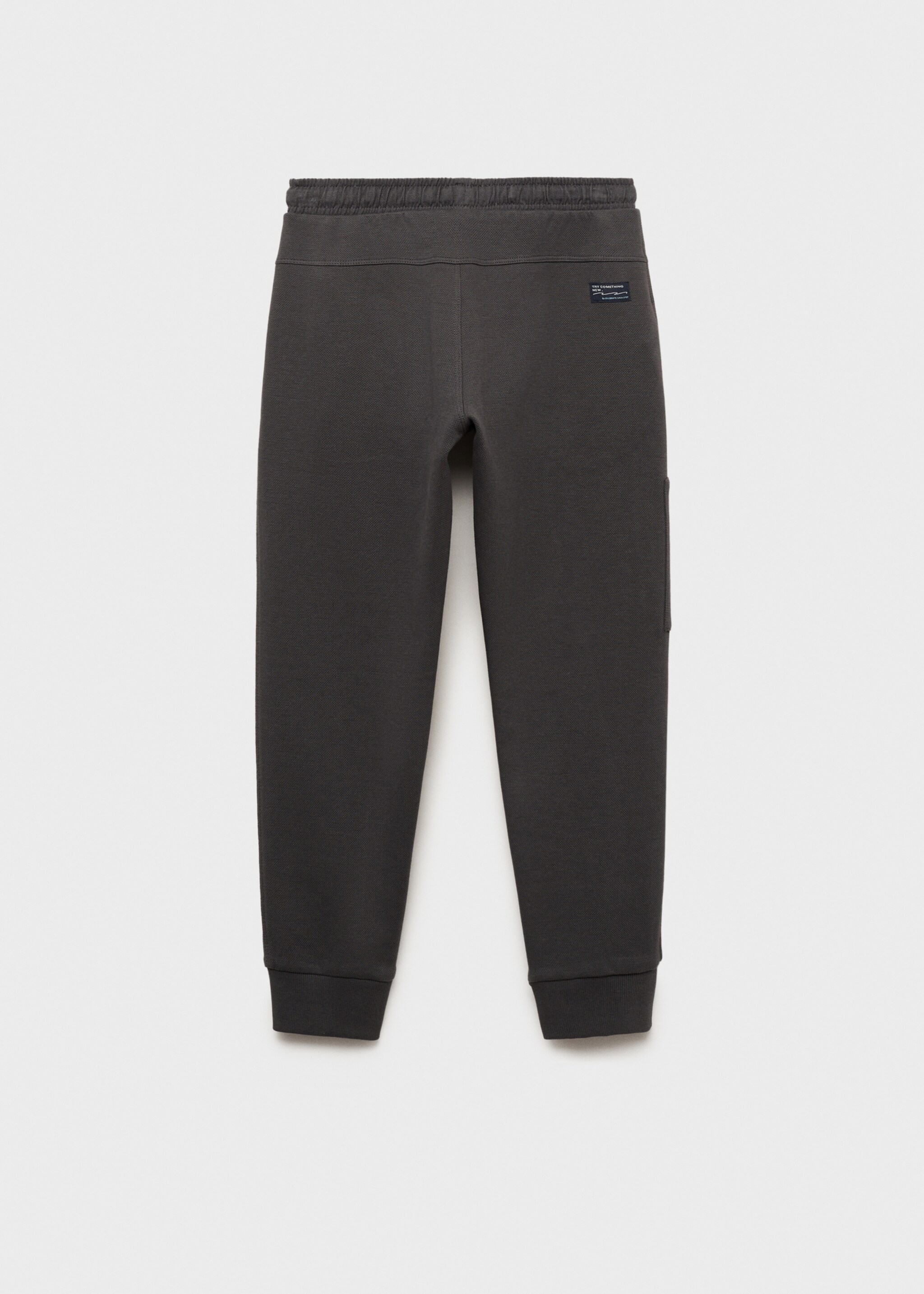 Jogger trousers with elastic waist - Reverse of the article