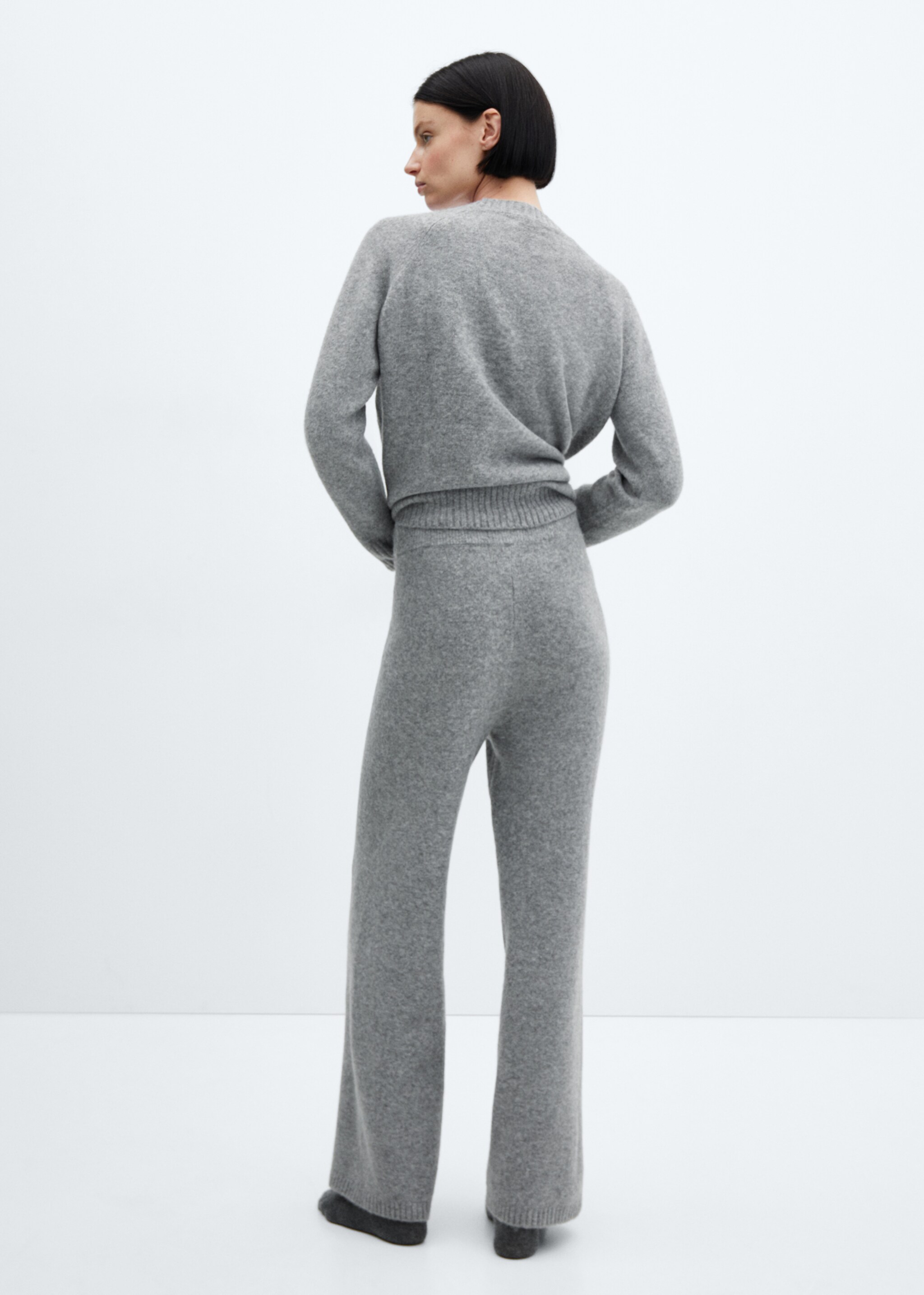 Long knitted trousers - Reverse of the article