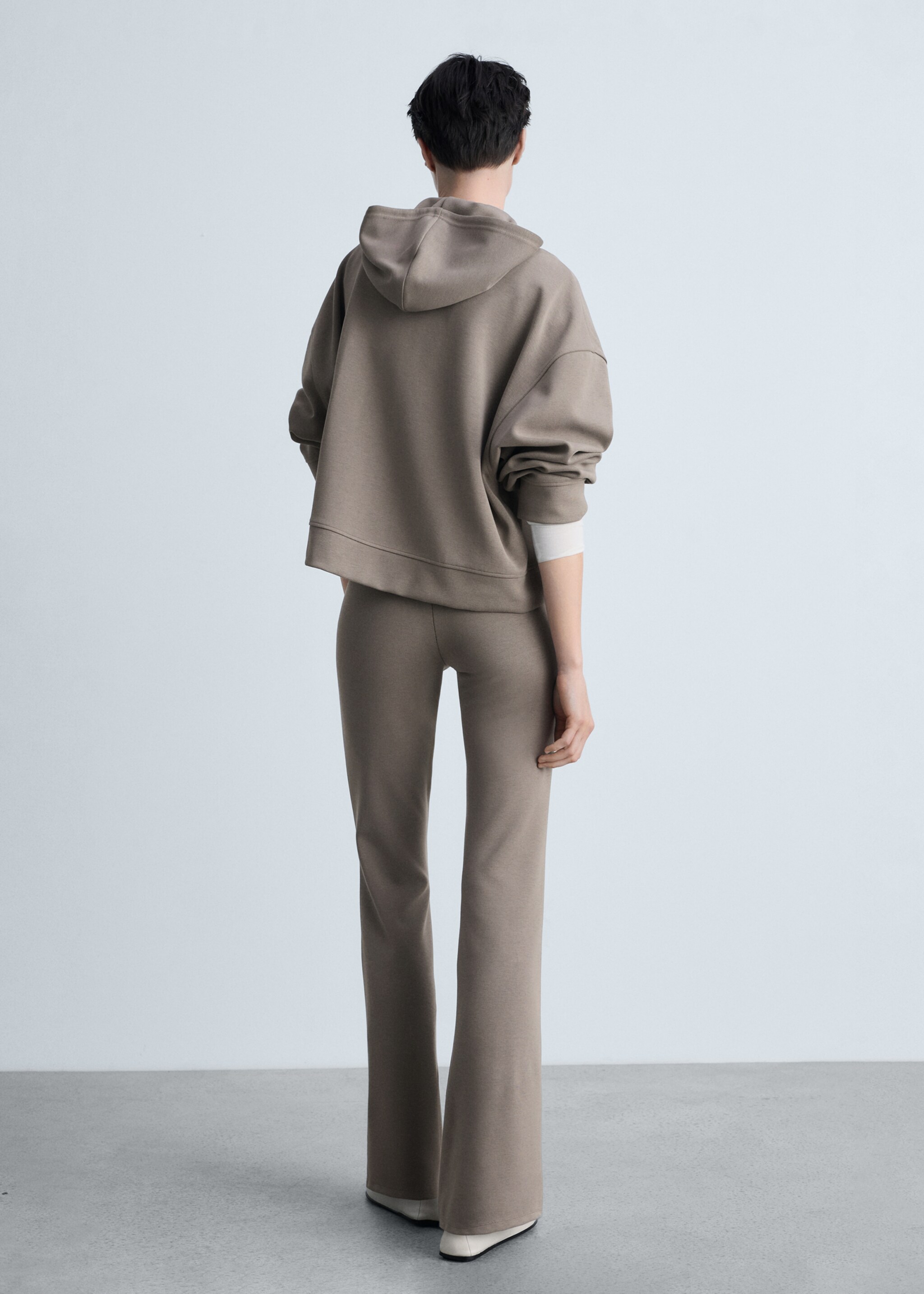 Flared knitted trousers - Reverse of the article