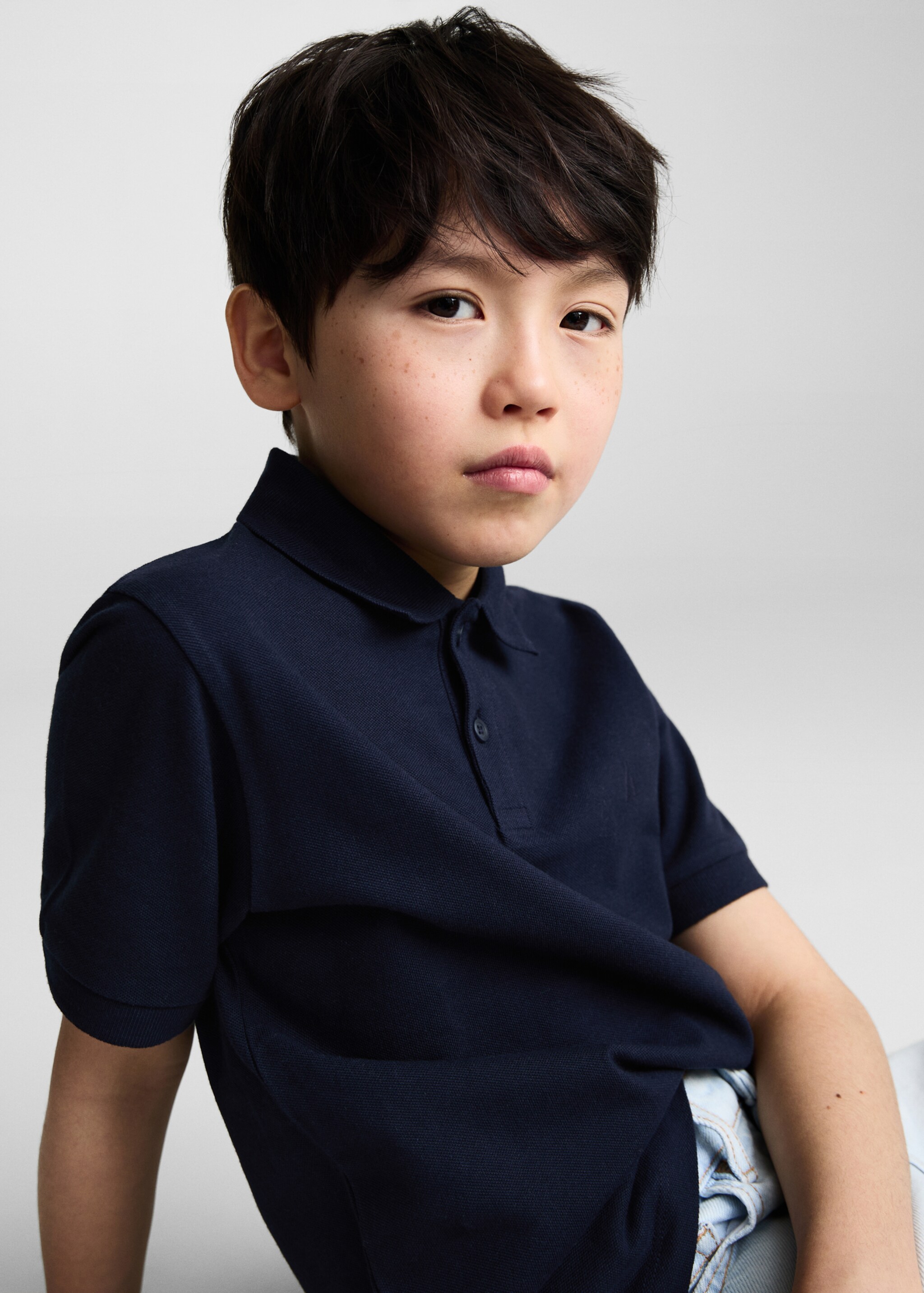 Short-sleeved cotton polo shirt - Details of the article 1