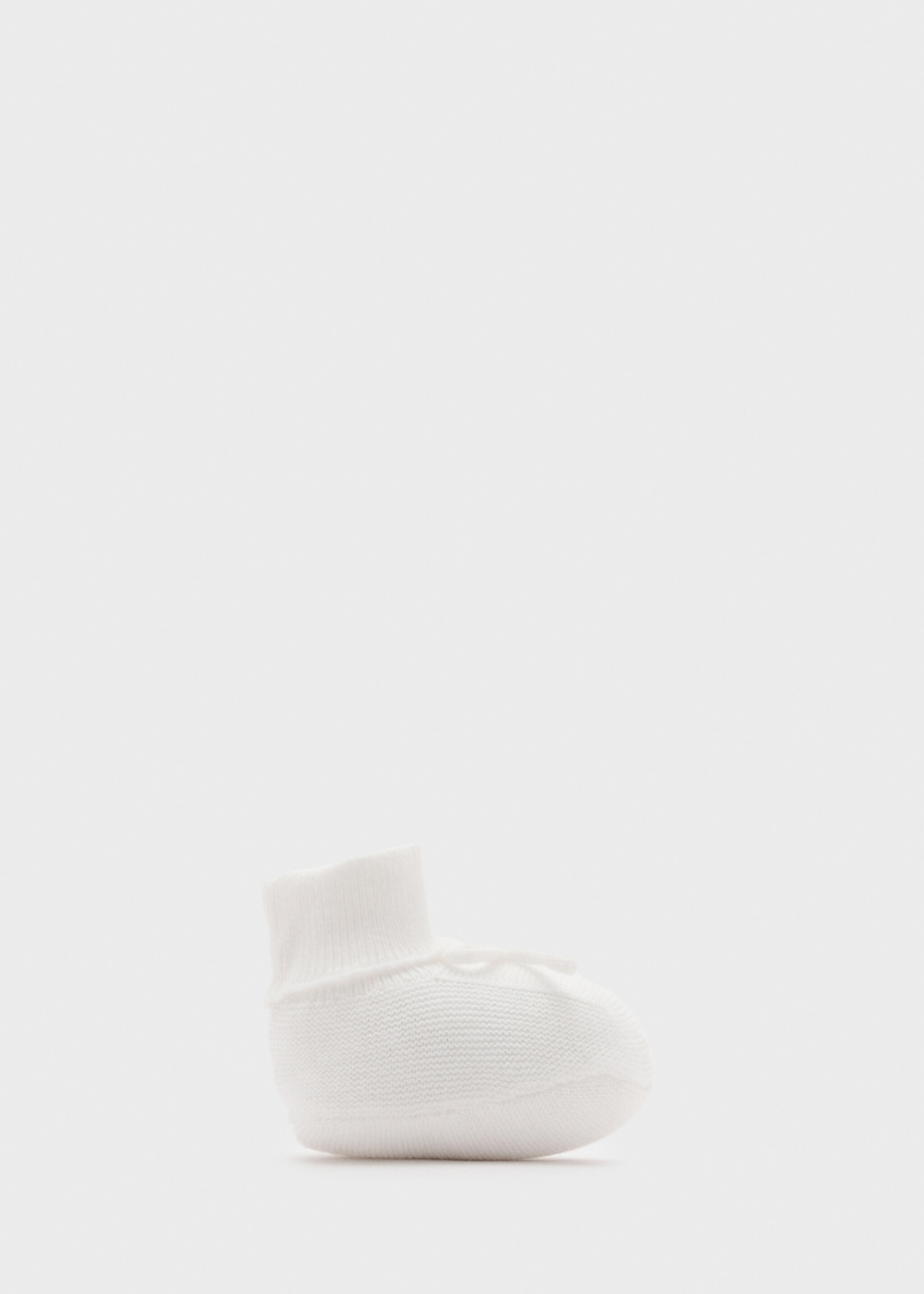 Knitted booties with bow - Article without model