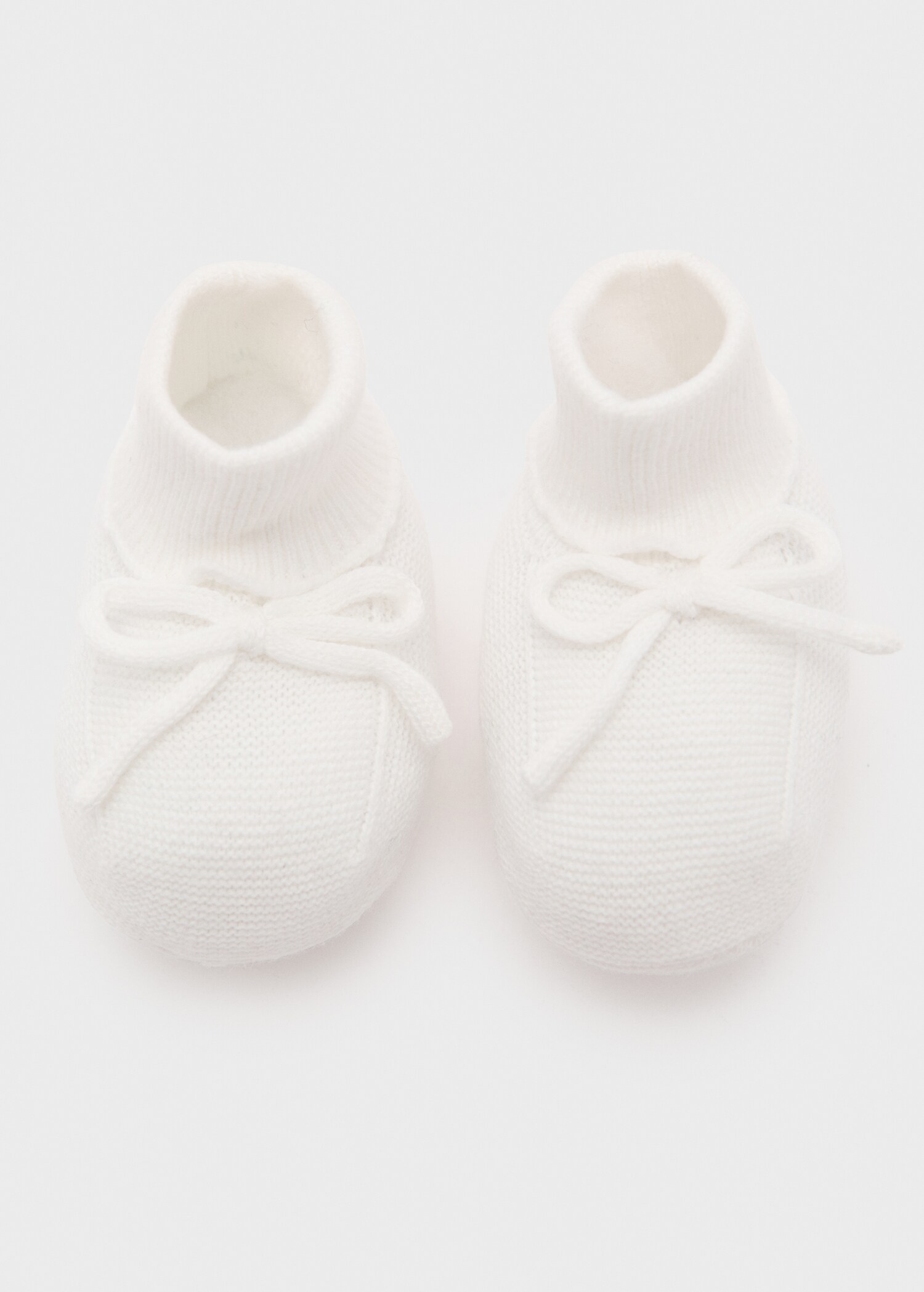 Gestrickte Babyschuhe mit Schleife - Detail des Artikels 8