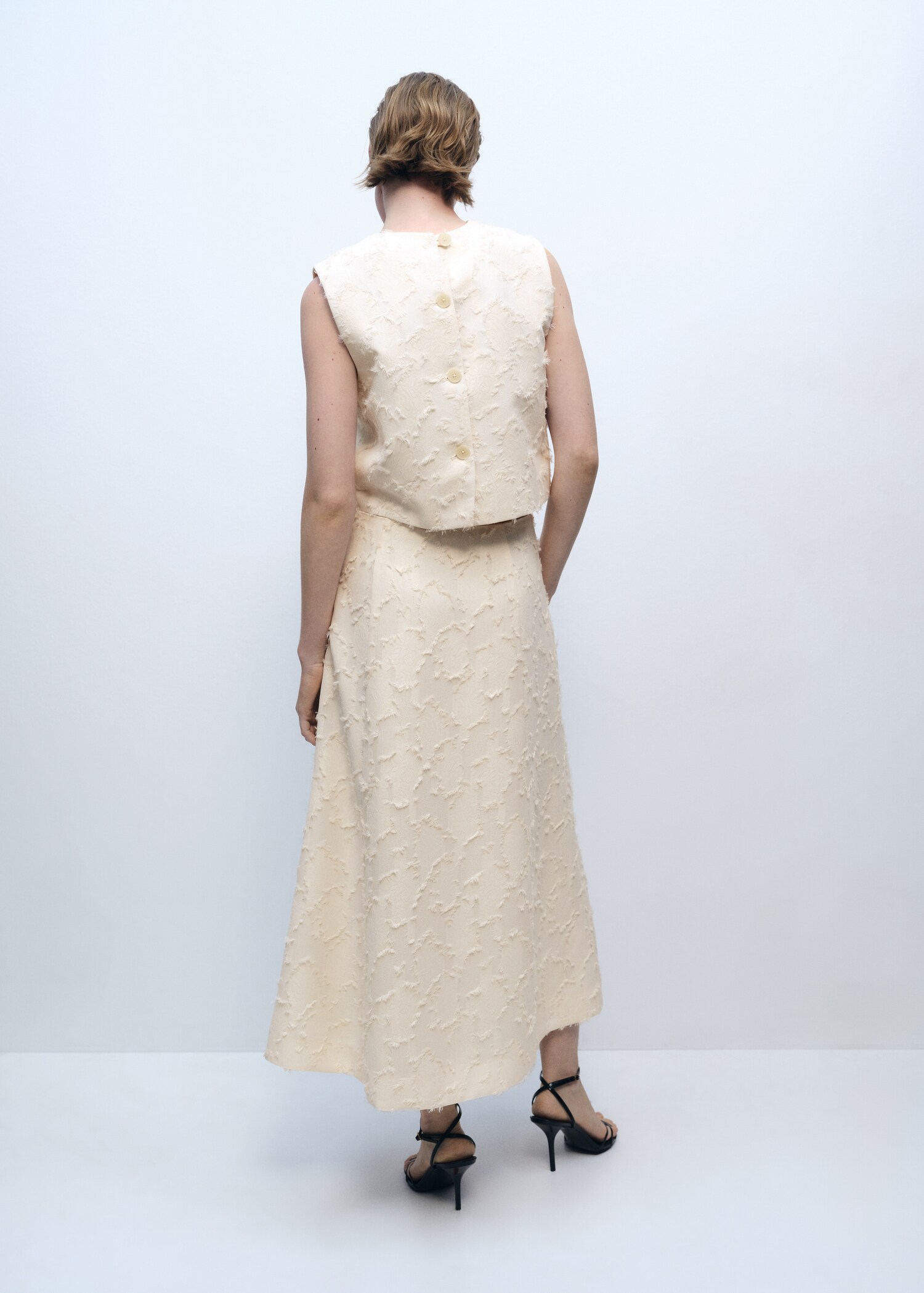 Textured flared skirt - Reverse of the article