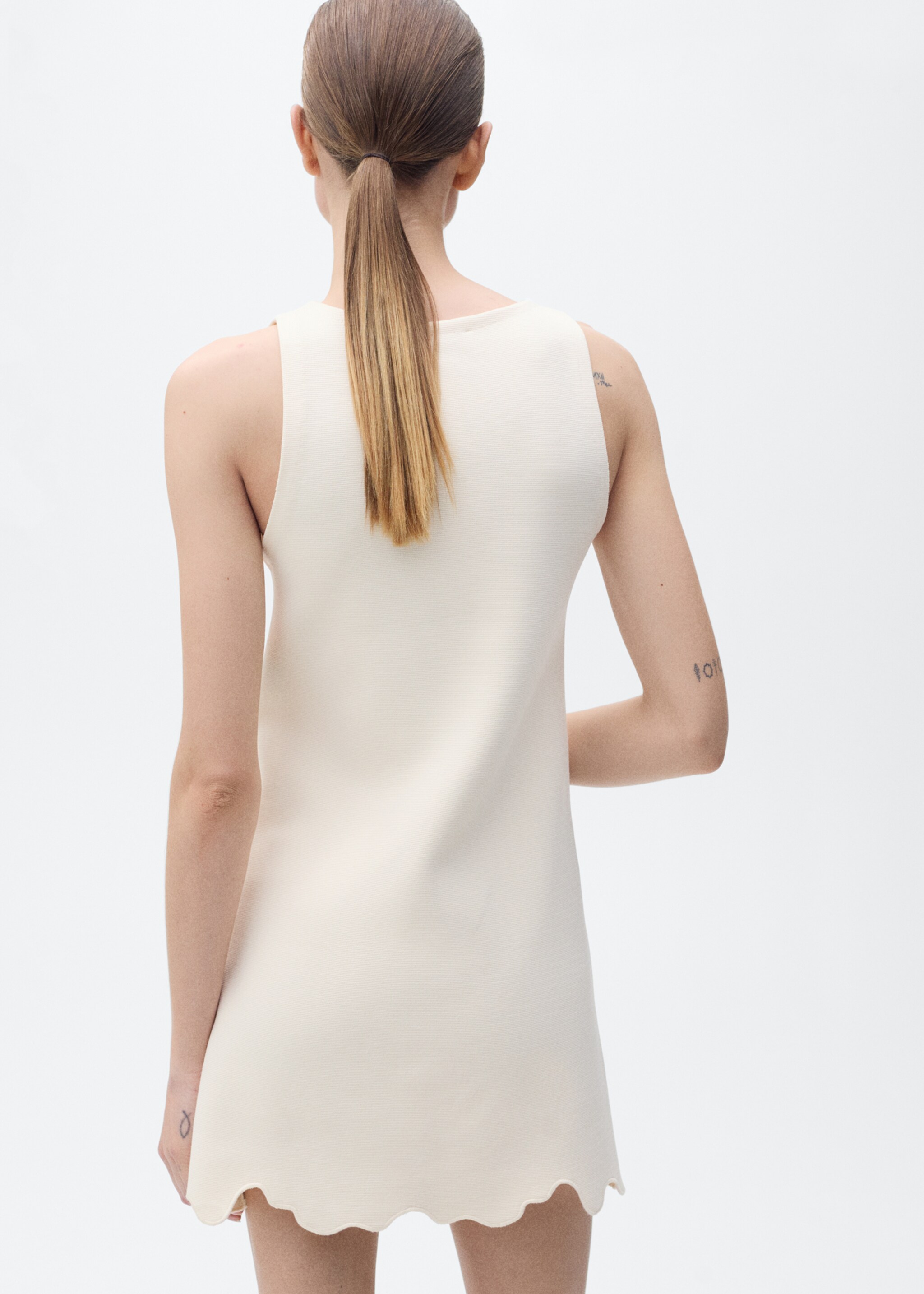 Knitted dress openwork details - Reverse of the article