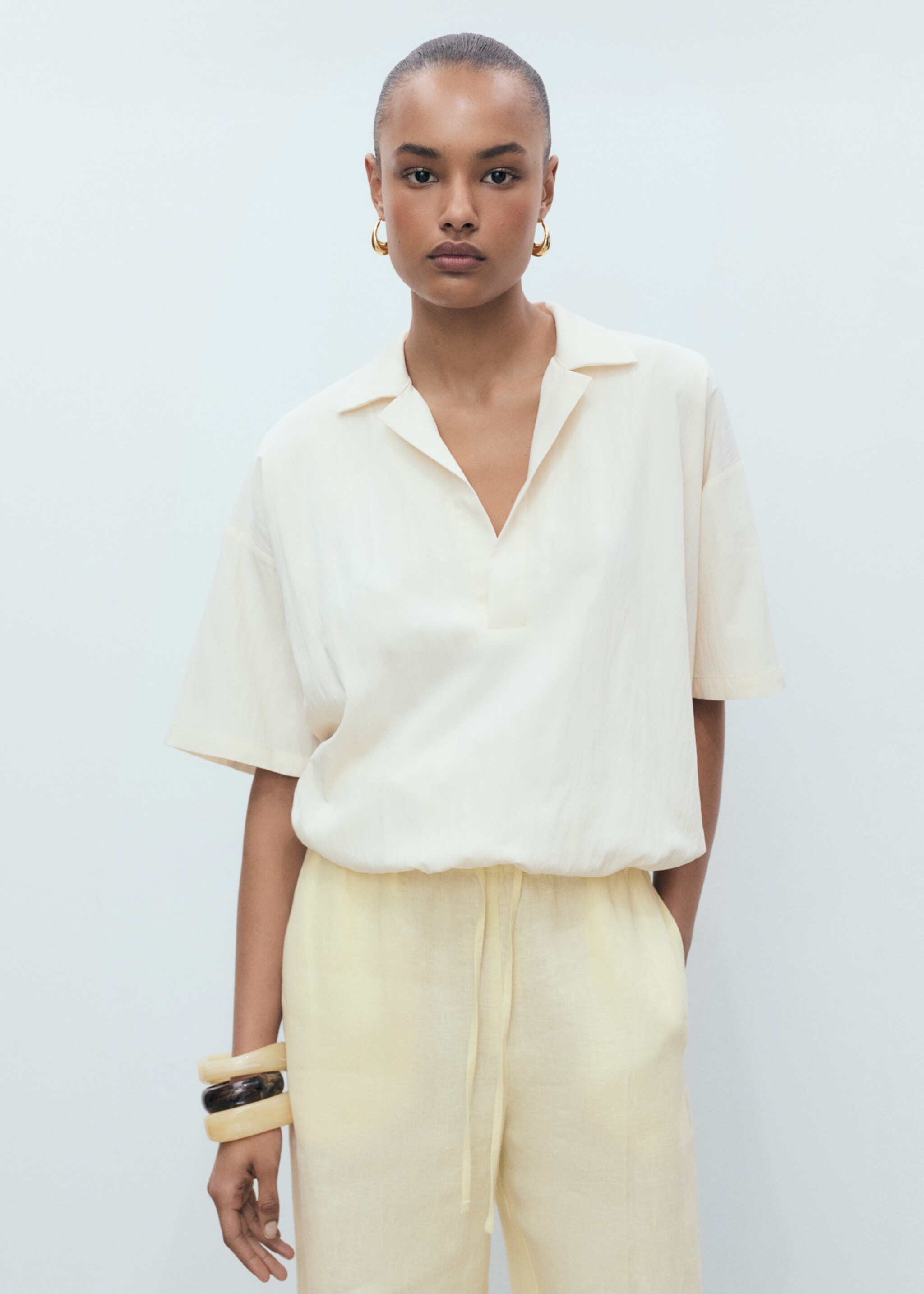Straight-fit linen trousers with bow - Details of the article 1