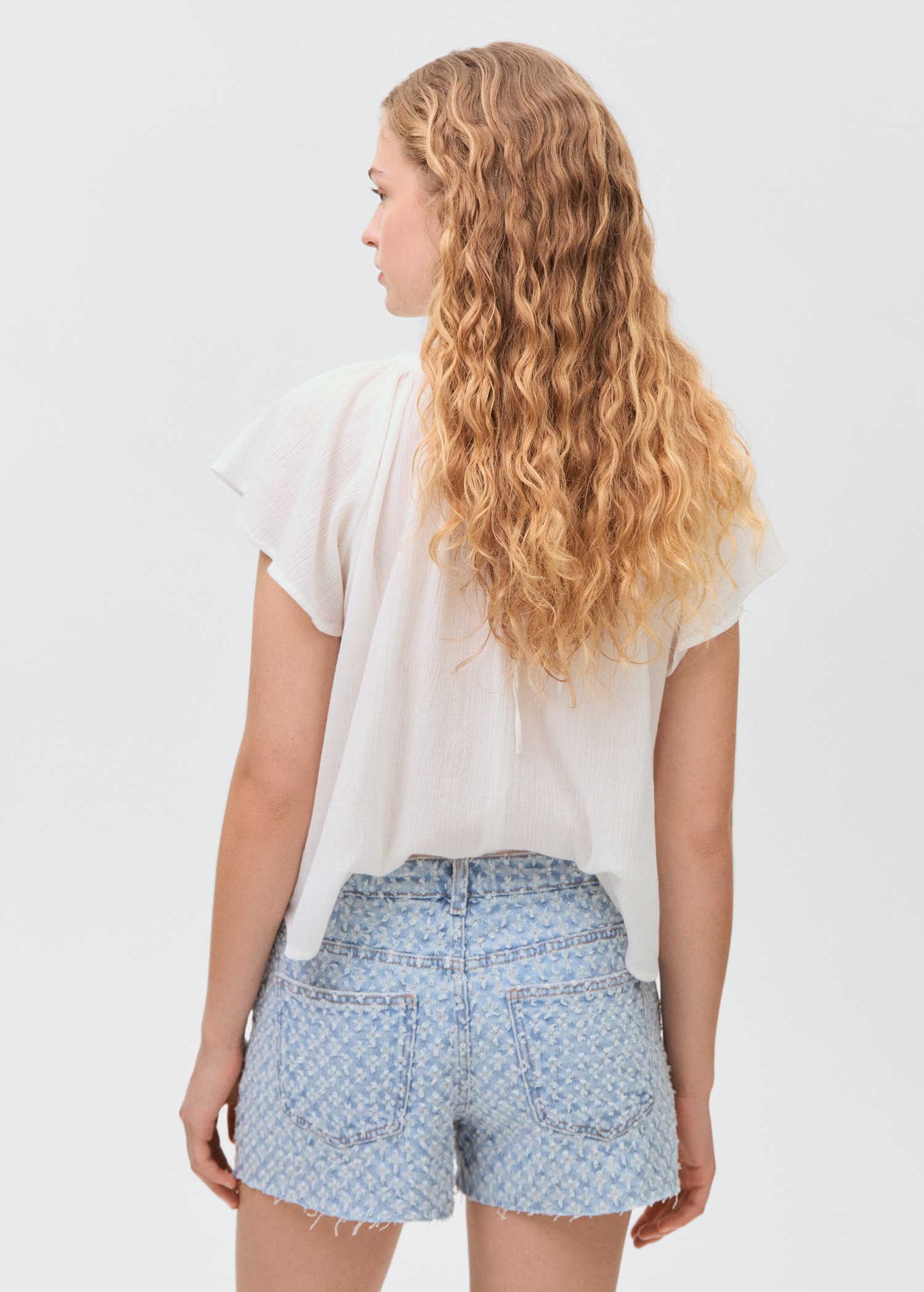 Frayed textured denim shorts - Reverse of the article