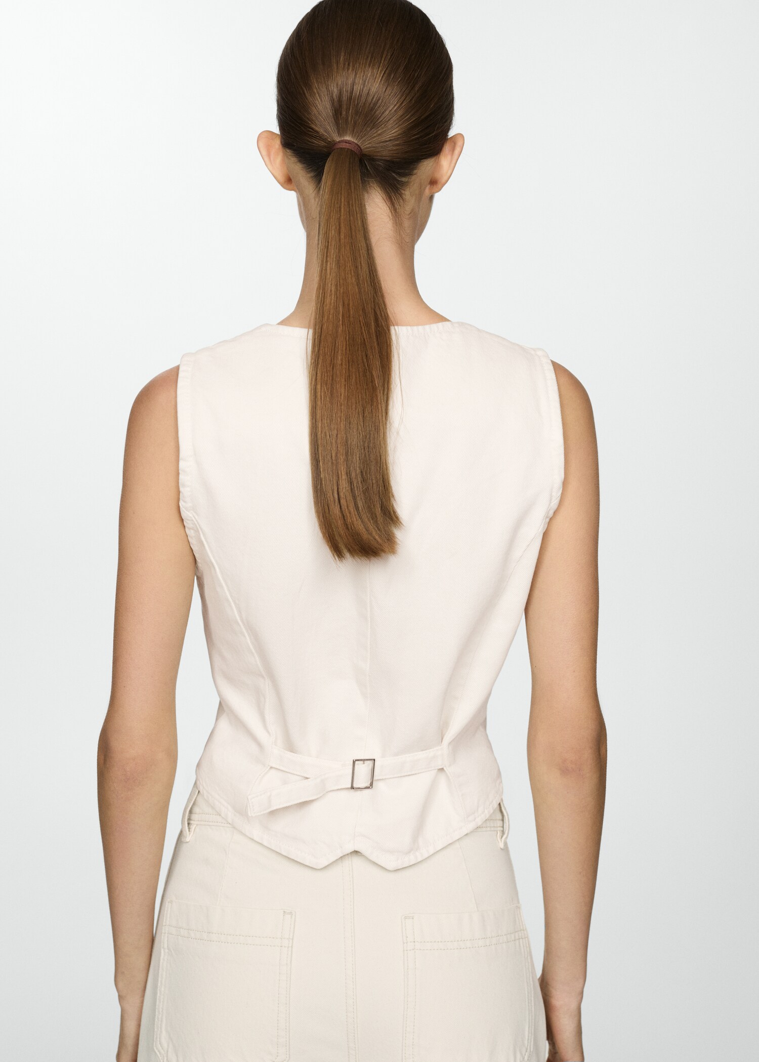 Buttoned denim gilet - Reverse of the article