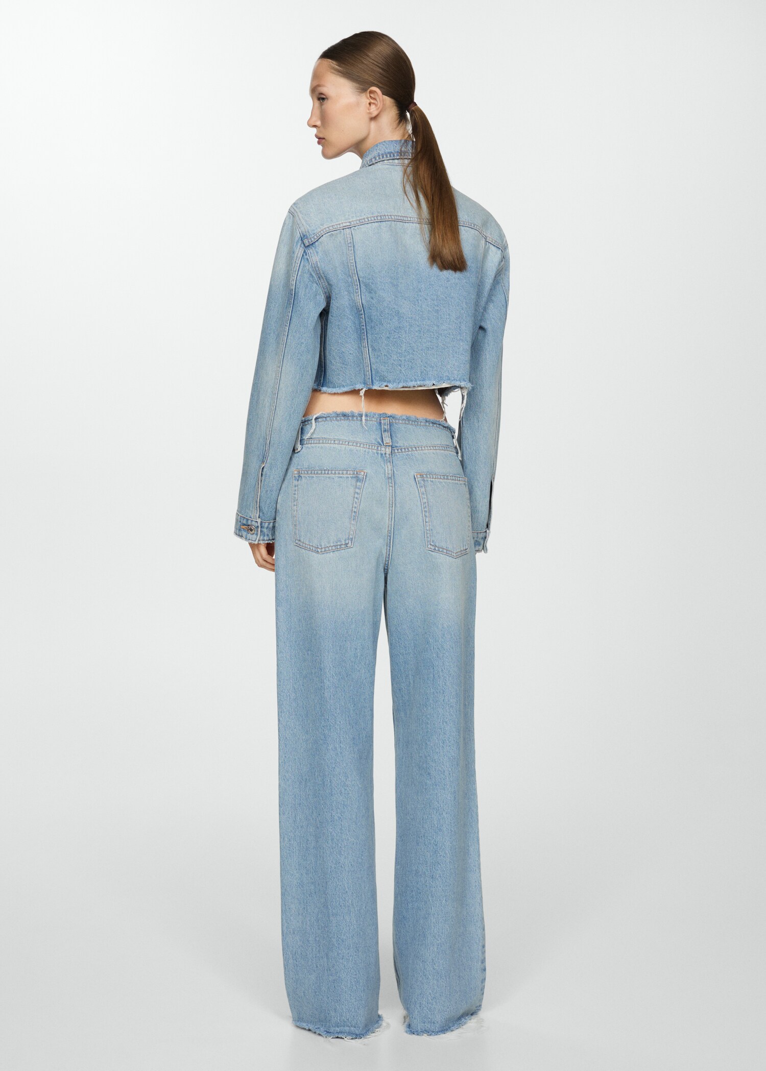 Denim jacket with frayed hem - Reverse of the article
