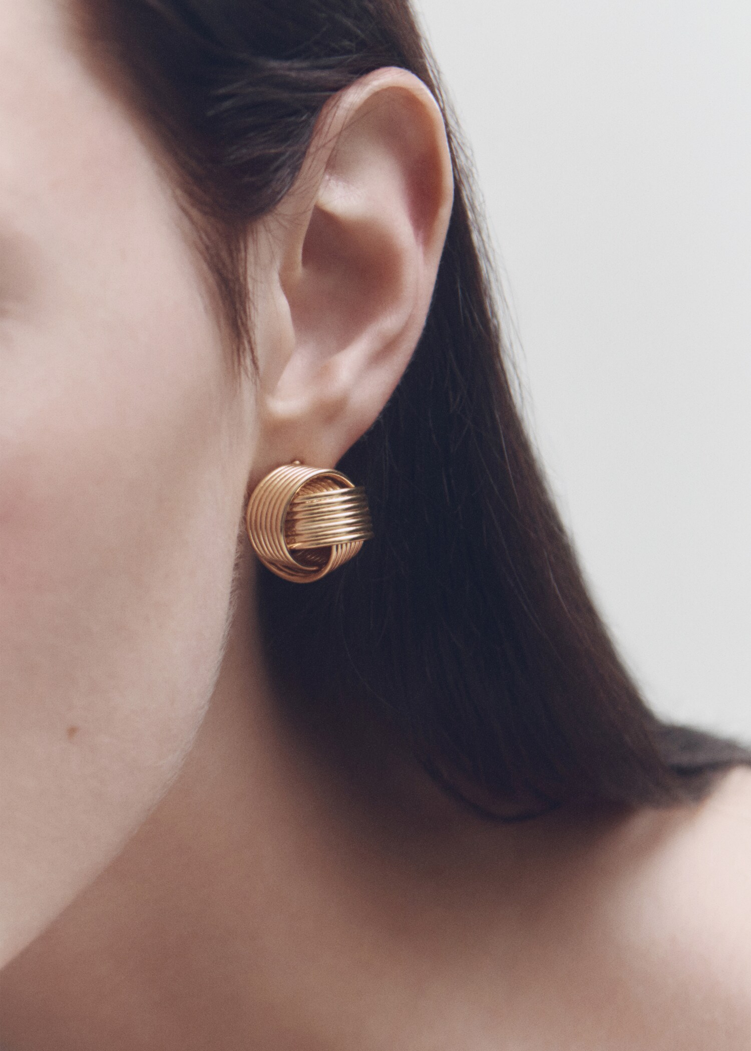 Interlocking circular earrings - General plane