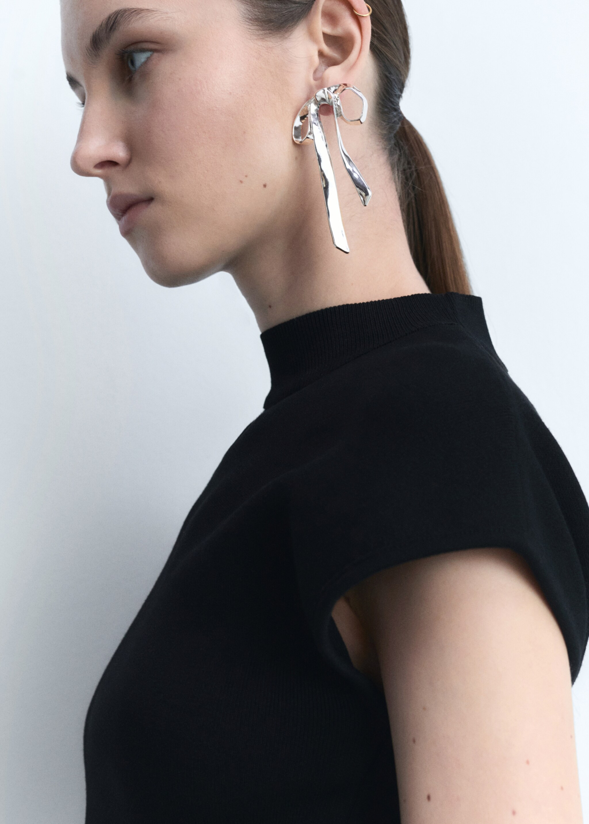 Boucles d'oreilles nœuds rigides - Plan général