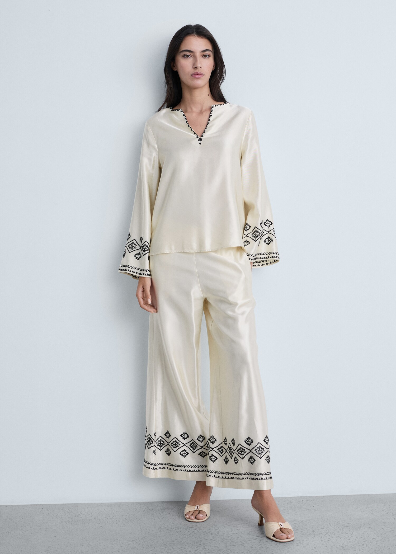 Wideleg trousers with embroidered hem - General plane