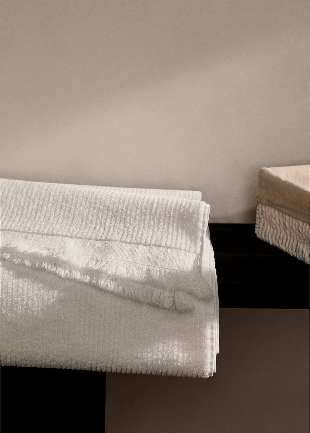 Stripe-embossed bath towel with fringes