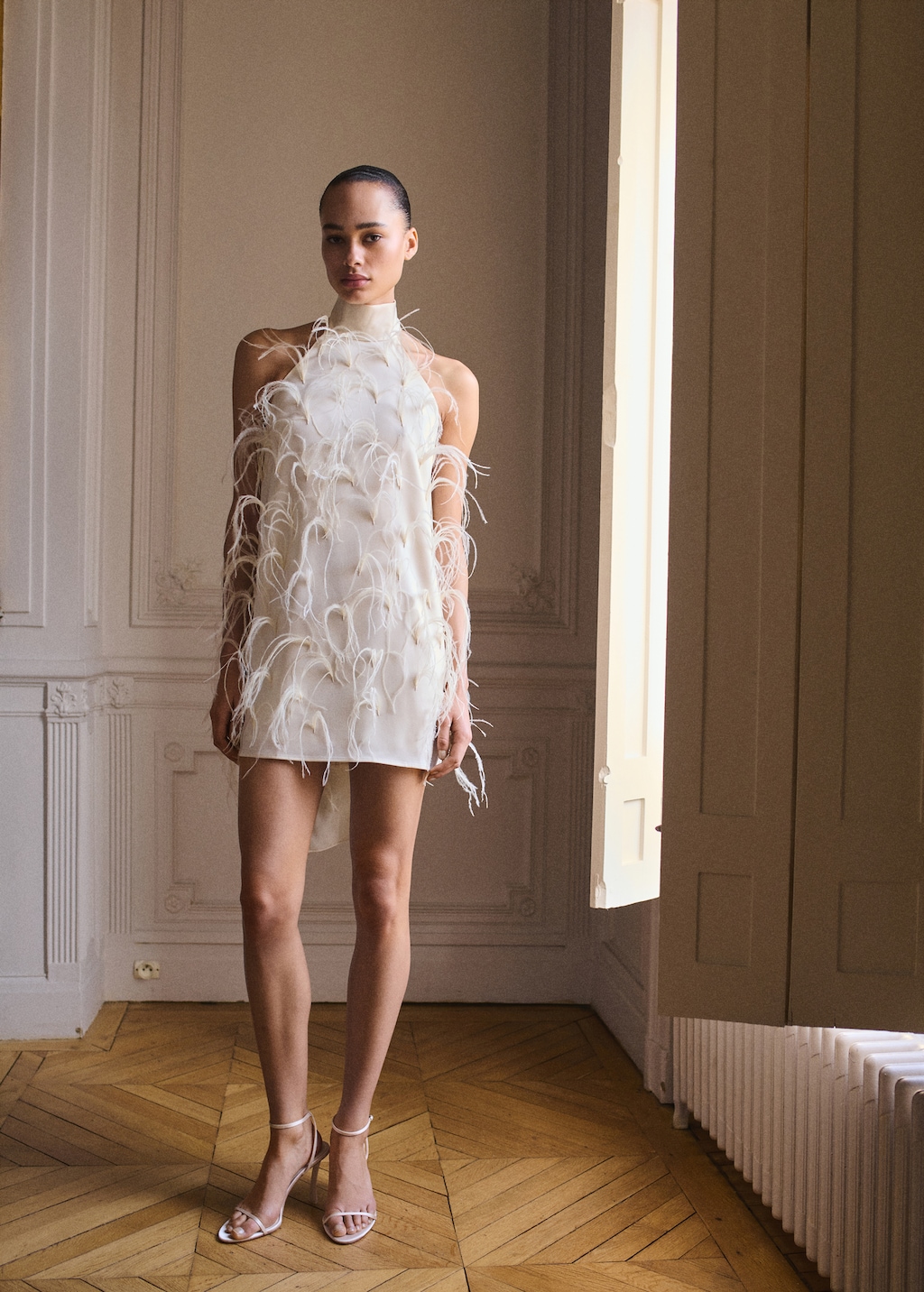 Halter dress with feather decoration