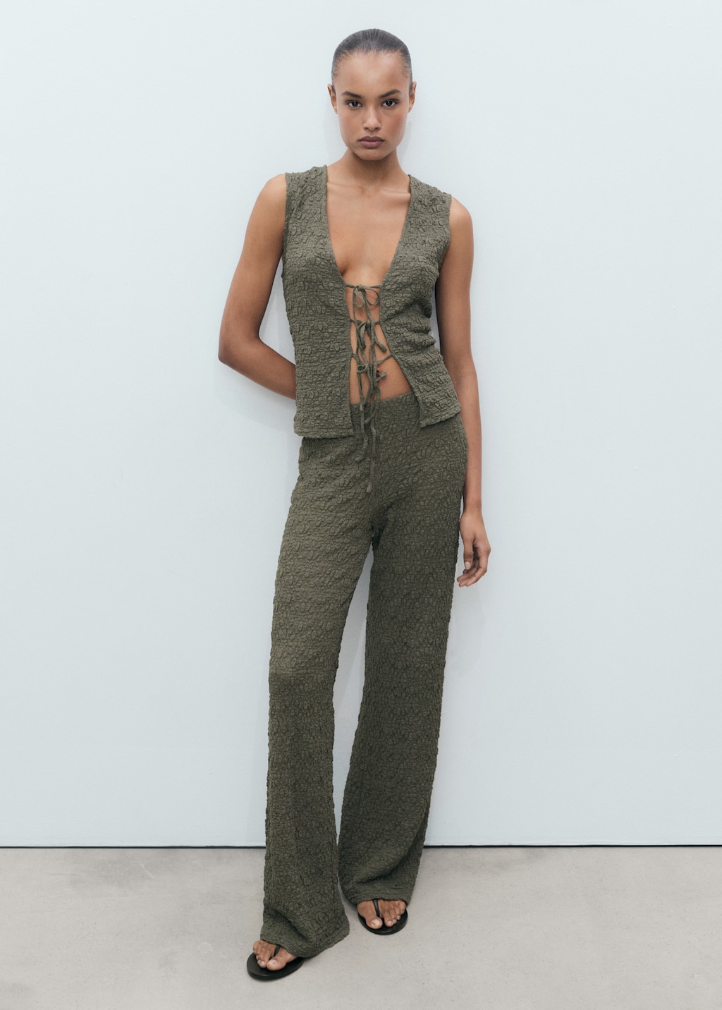 Textured top with bow - image 2