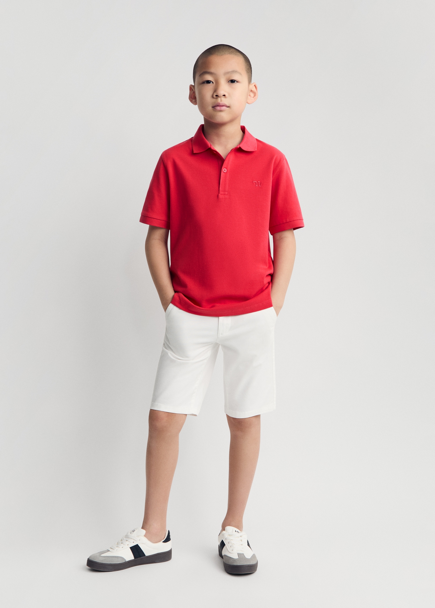 Short-sleeved cotton polo shirt Kids MANGO Georgia