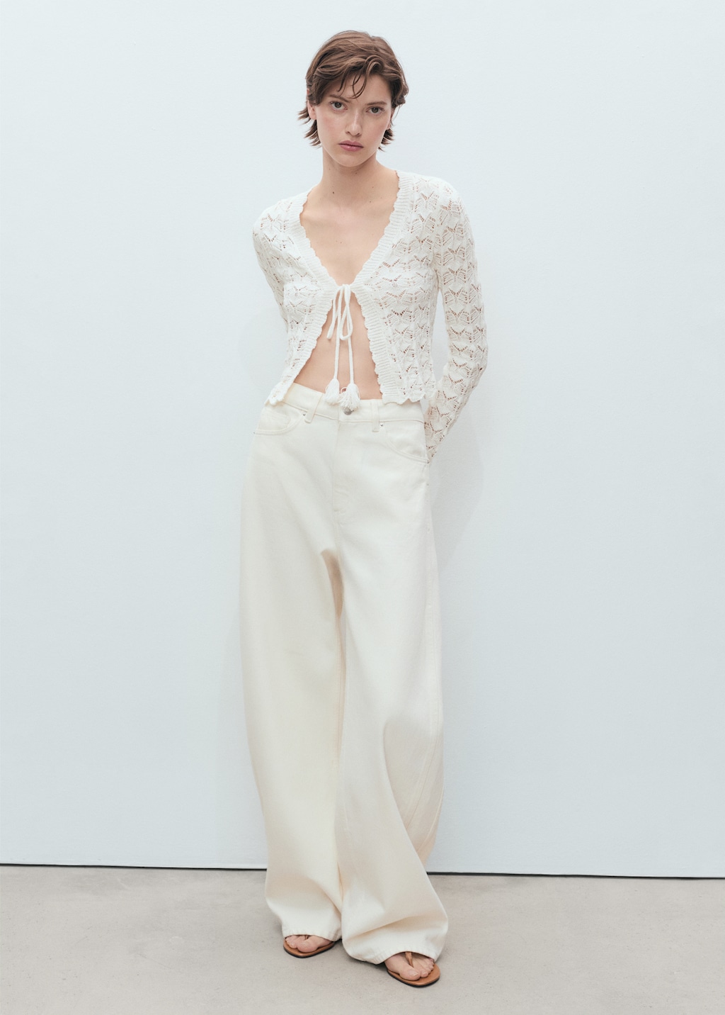 Crochet cardigan with bow closure