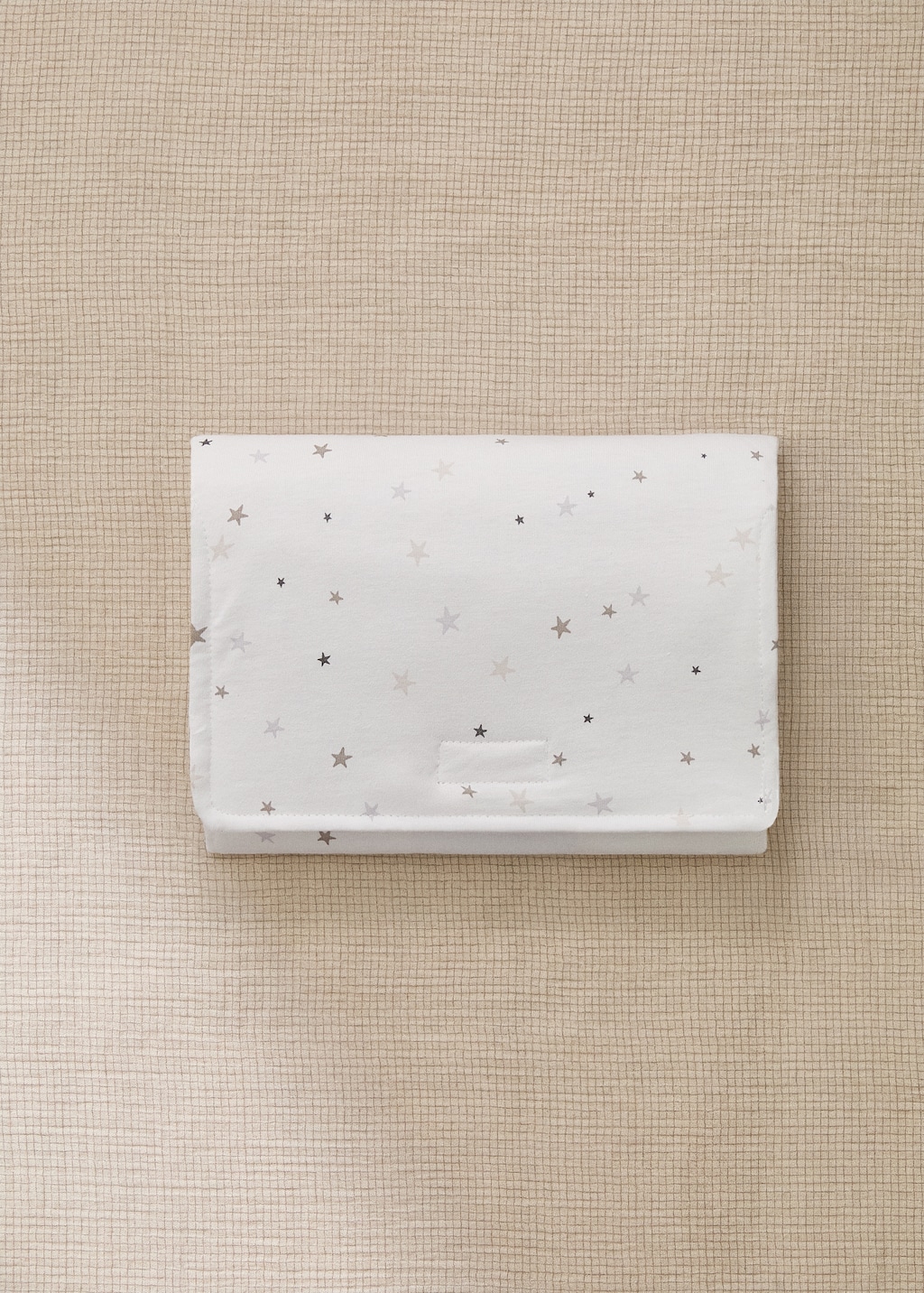 Baby changing mat with embroidered stars