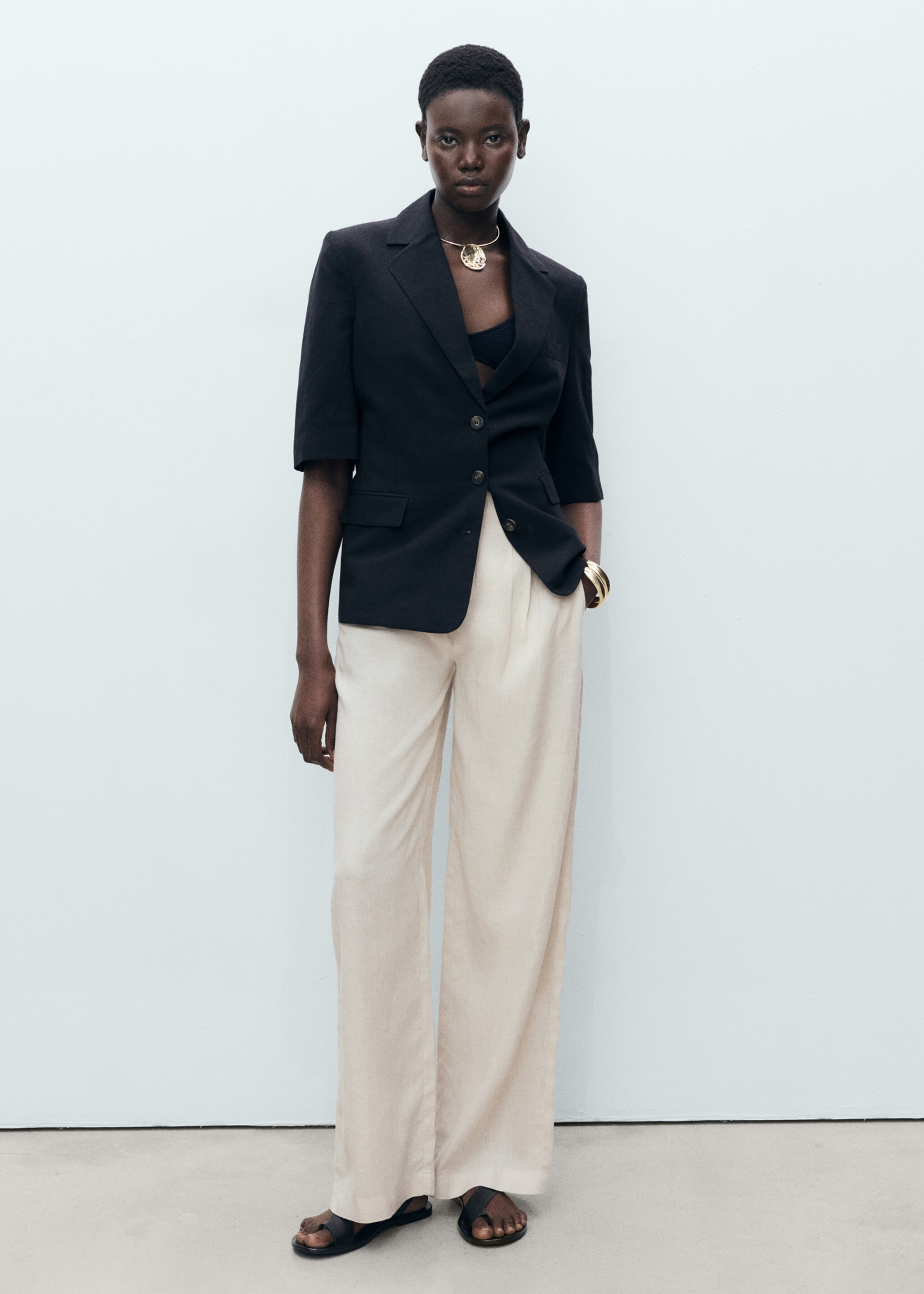 Linen trousers with tortoiseshell button - General plane