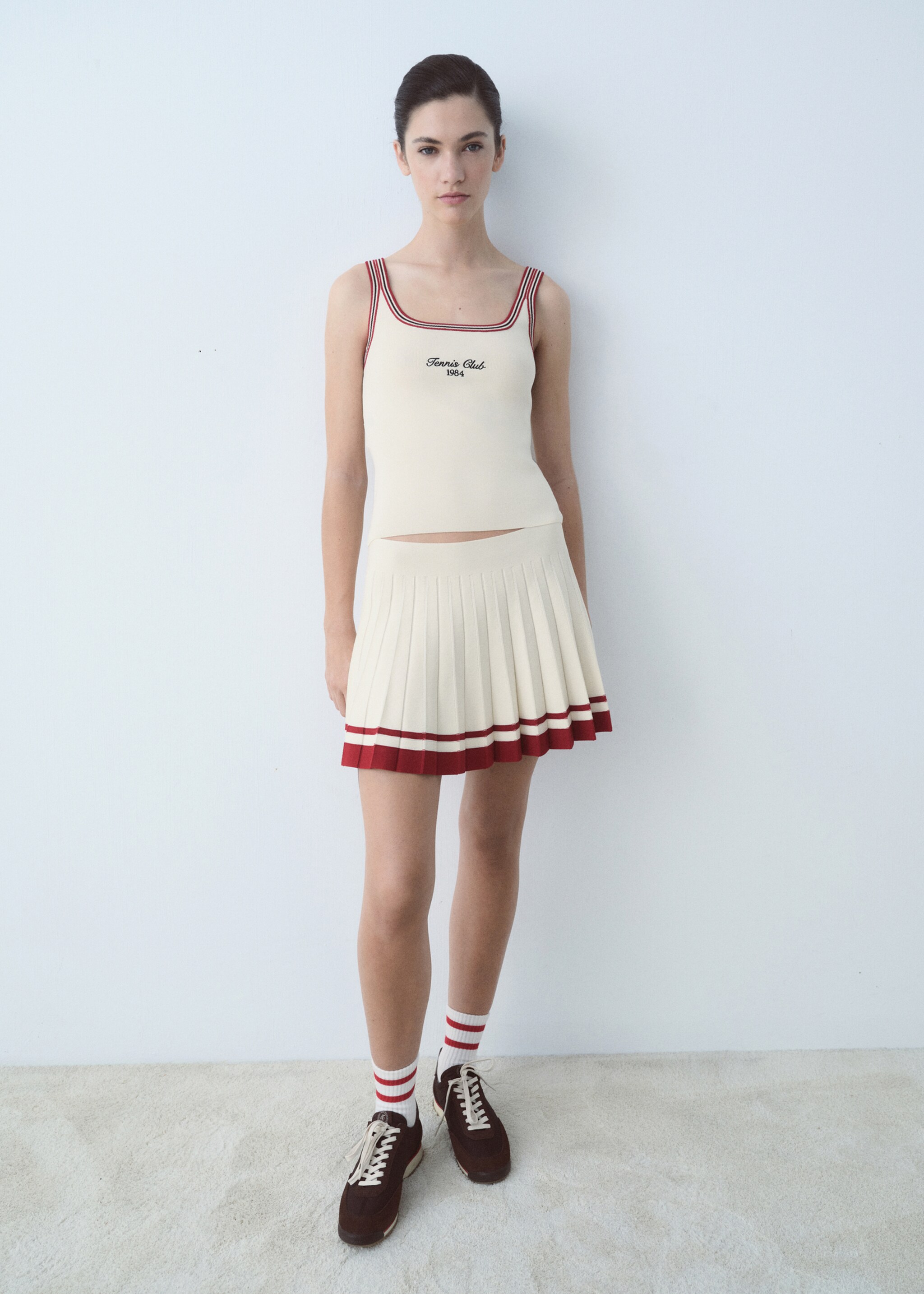 Top with embroidered message and contrasting trim - General plane