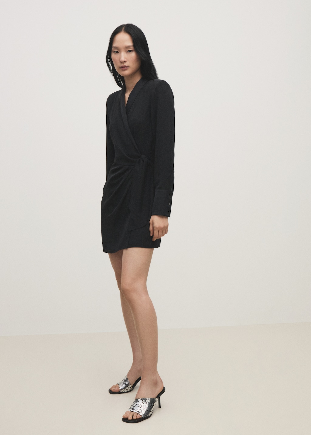 Heeled sandals with metal decorations