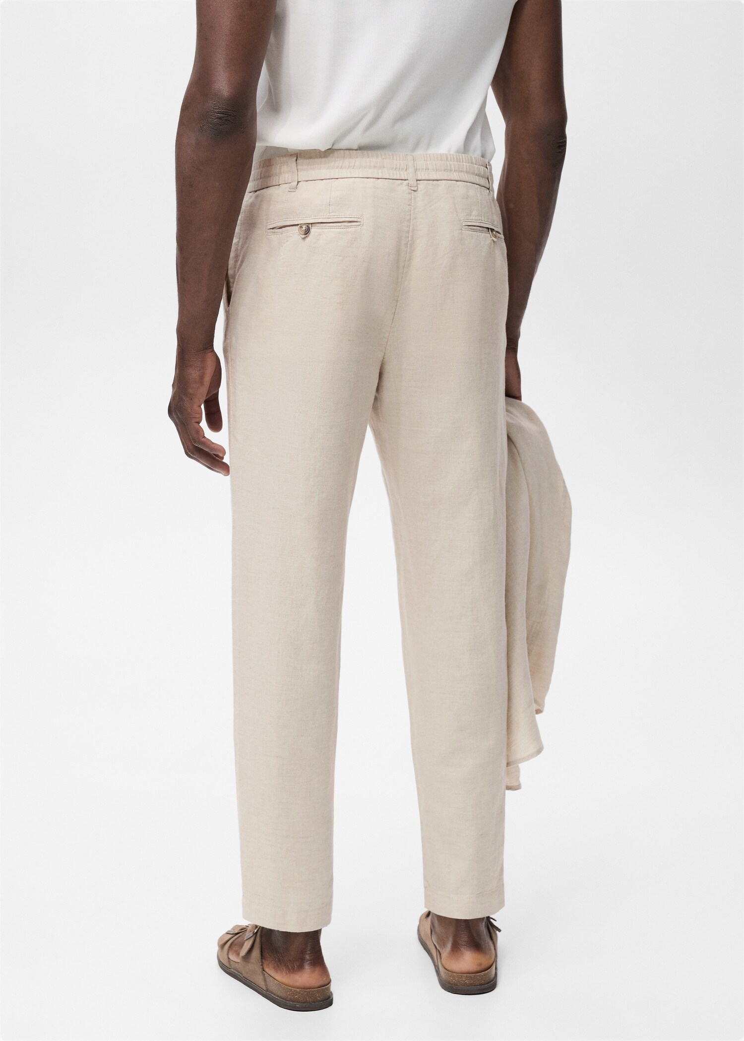 Slim-fit trousers with drawstring - Reverse of the article