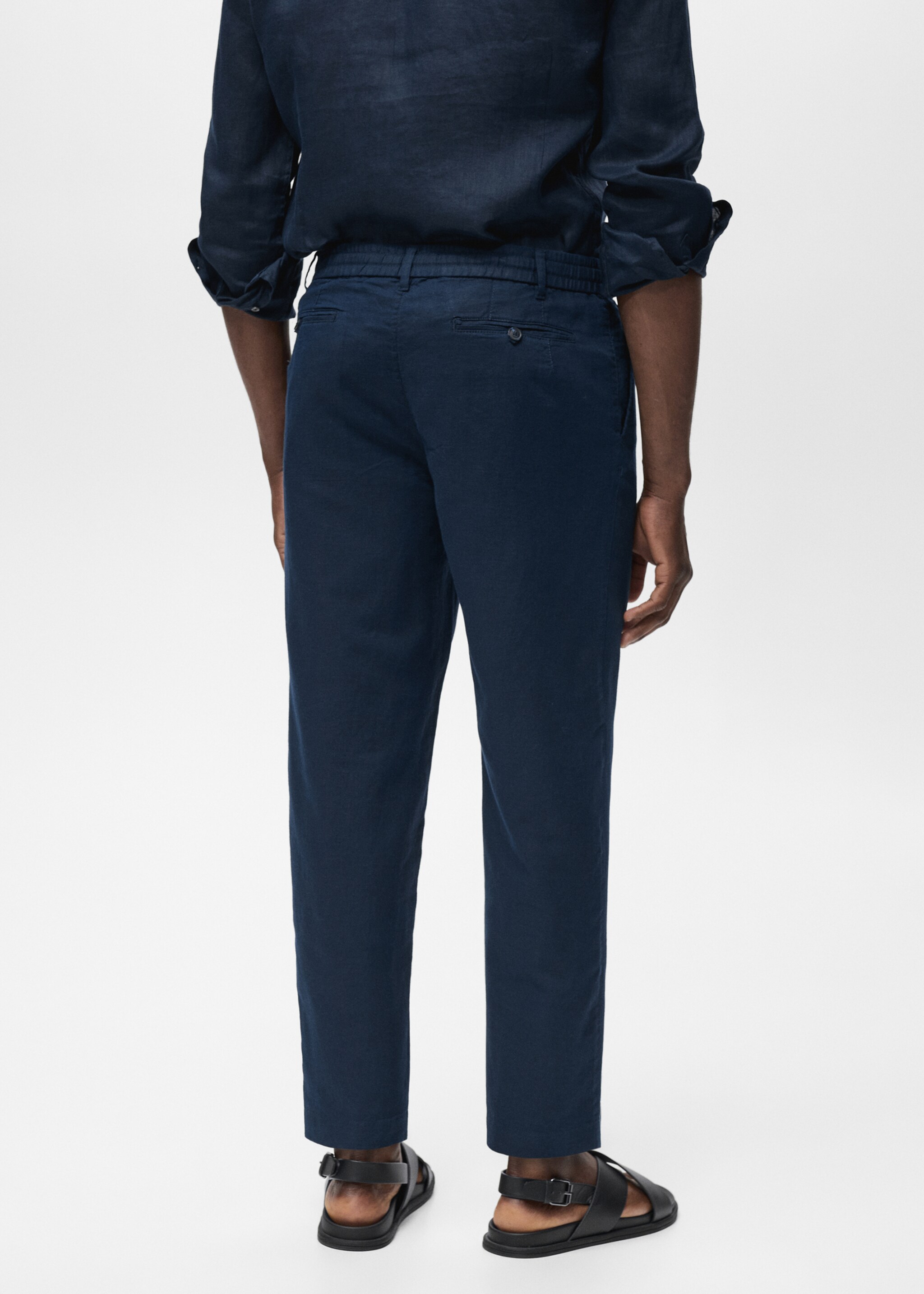 Slim-fit trousers with drawstring - Reverse of the article