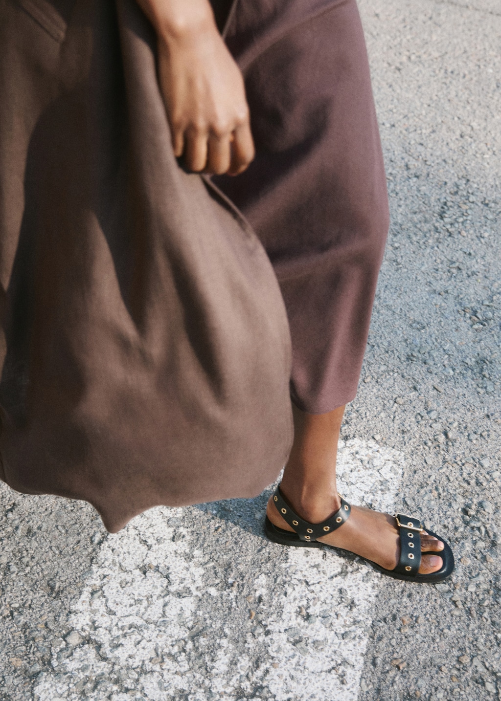 Strap sandals with buckles and eyelet details