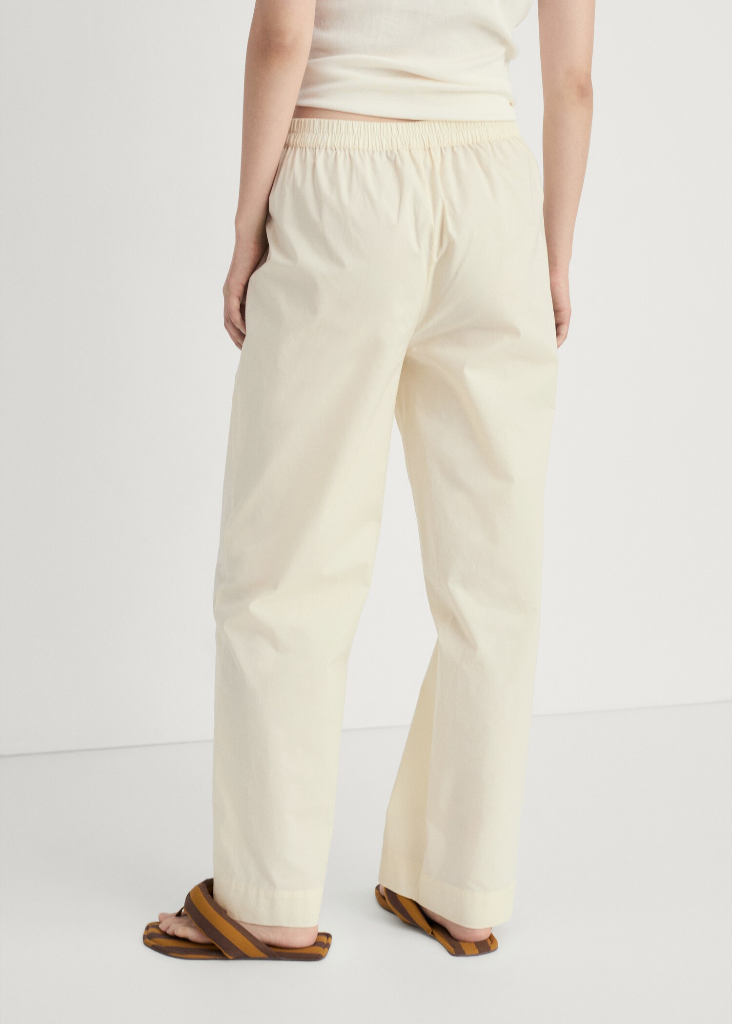 Garment-washed cotton trousers - Reverse of the article