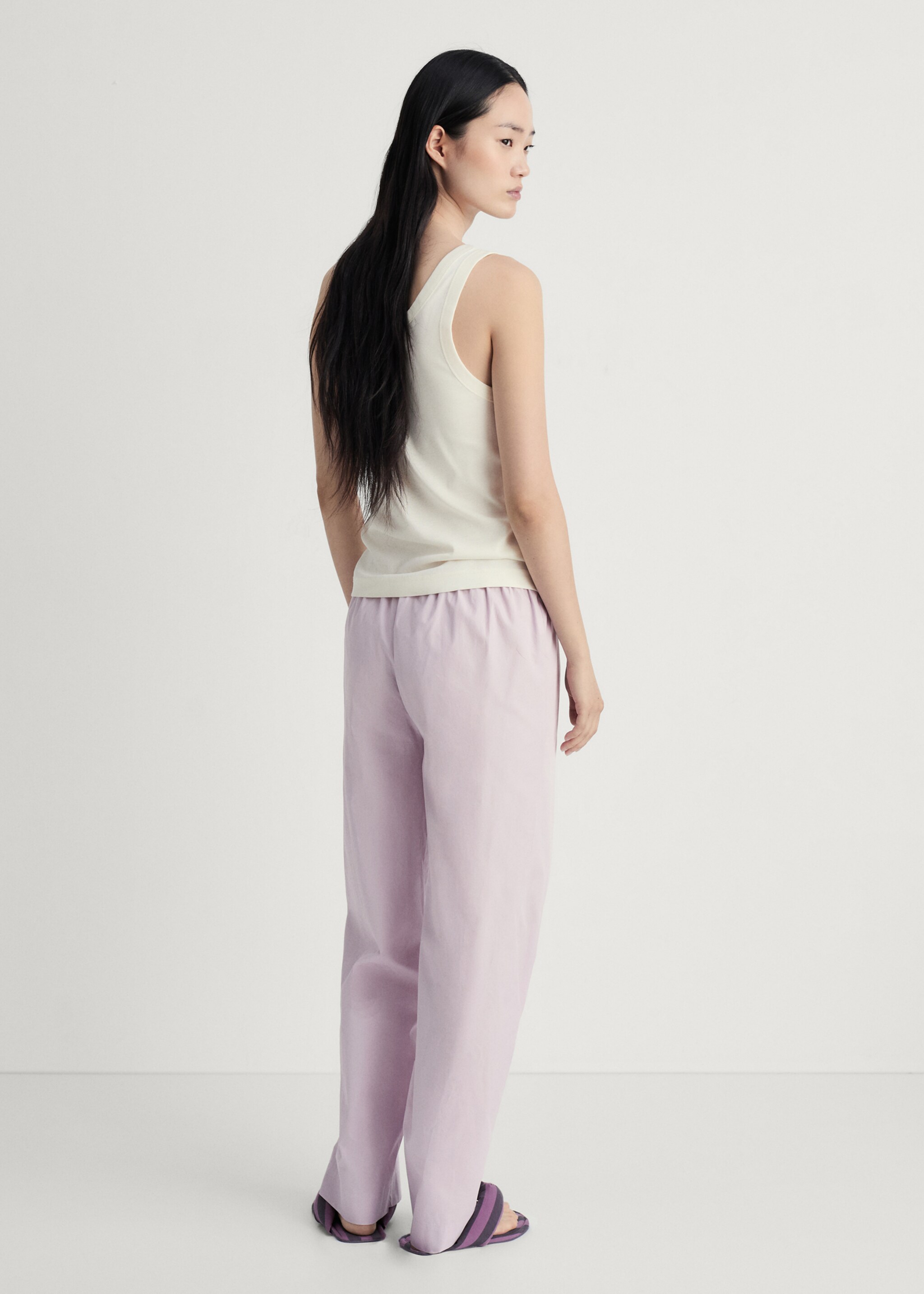 Garment-washed cotton trousers - Reverse of the article
