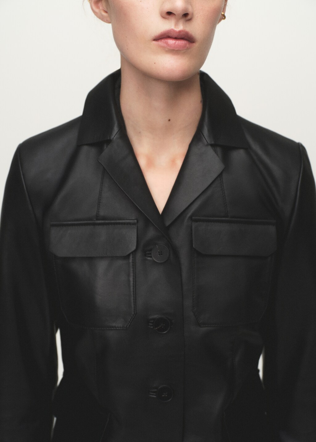 Leather jacket with flap pockets