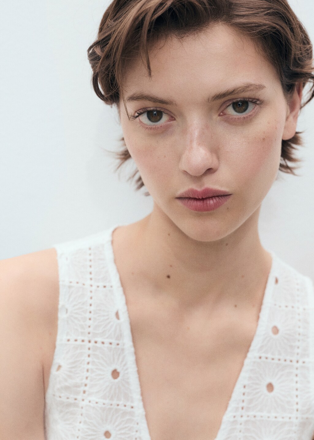 Embroidered cotton vest with bows