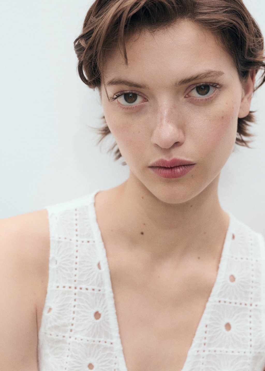 Embroidered cotton vest with bows