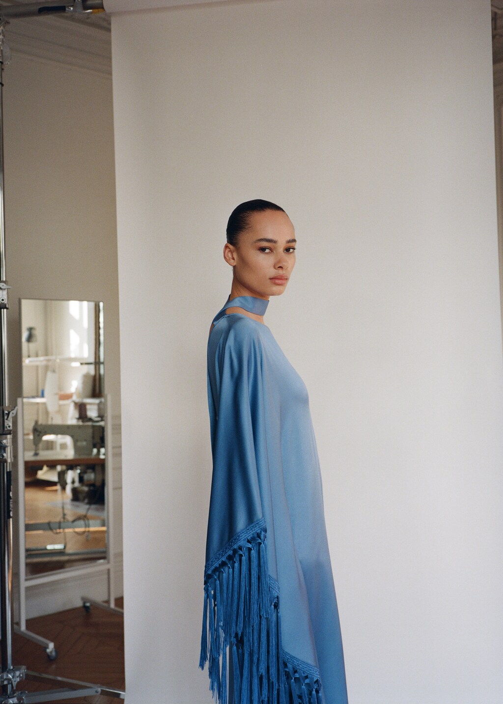 Asymmetrical satin dress with fringes