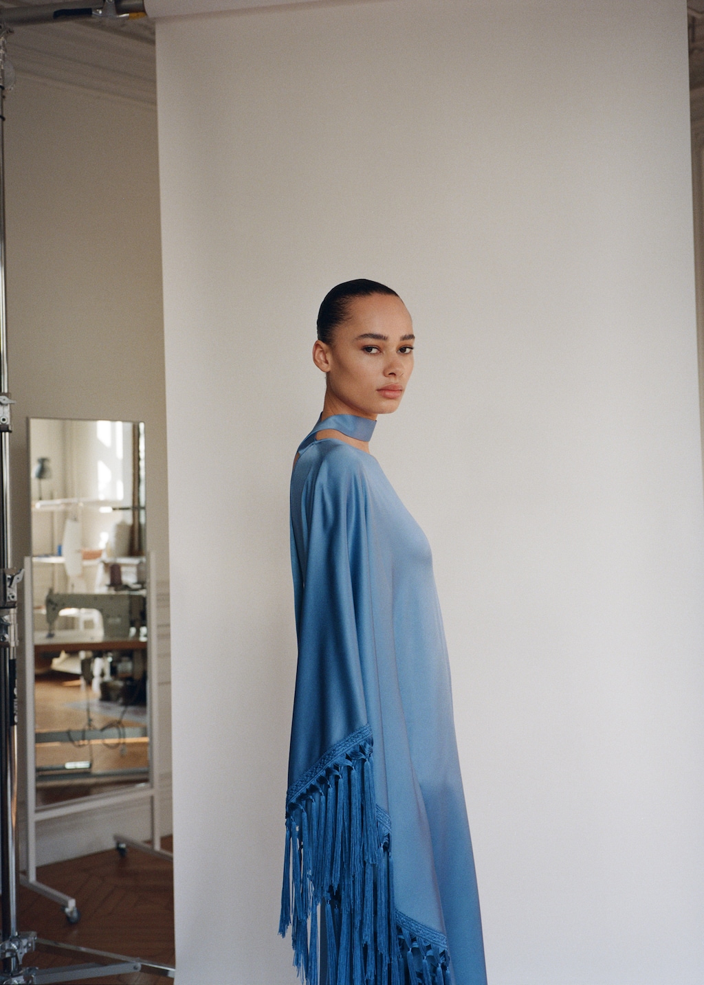 Asymmetrical satin dress with fringes