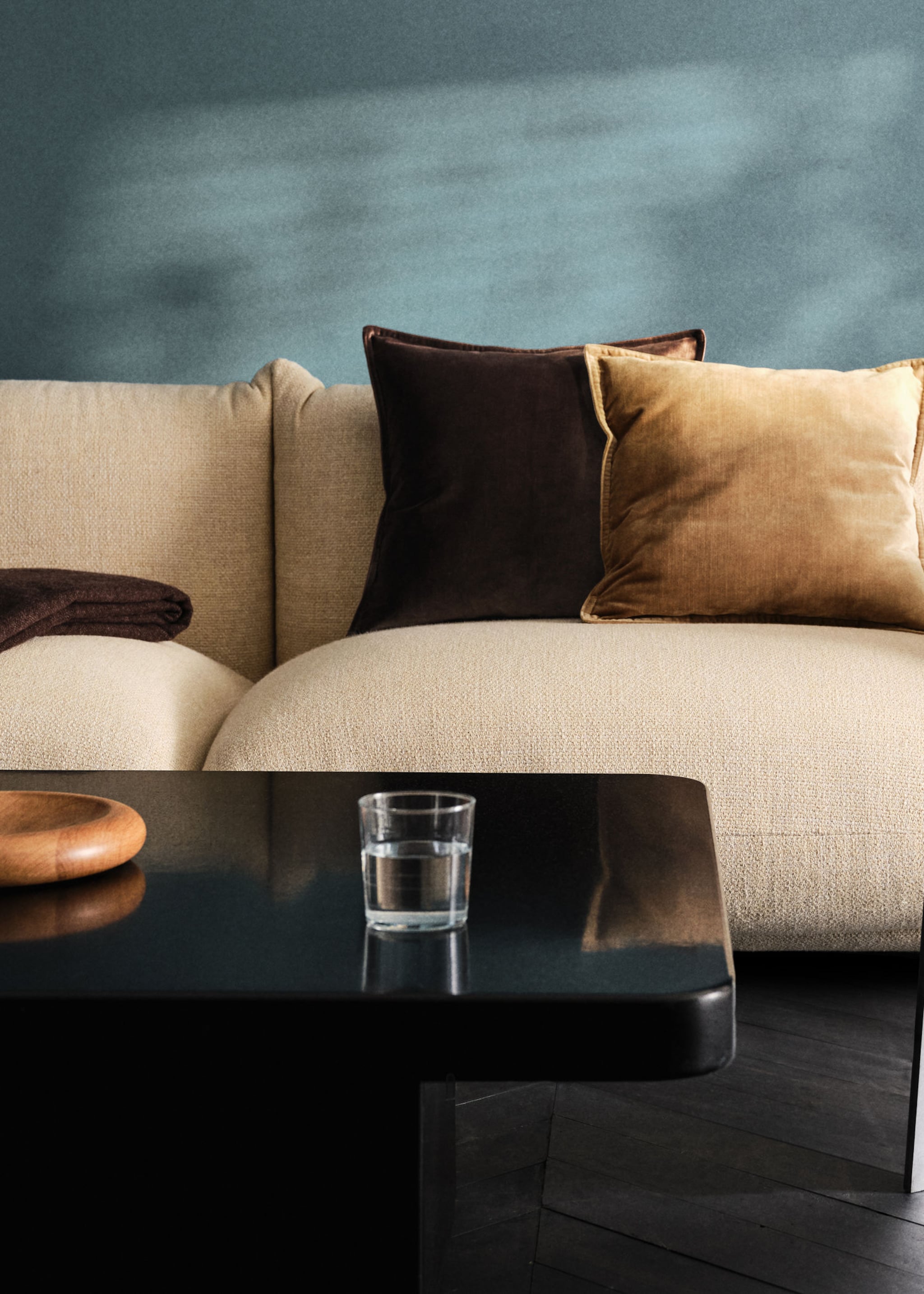 Combine cushions with beige sofa.