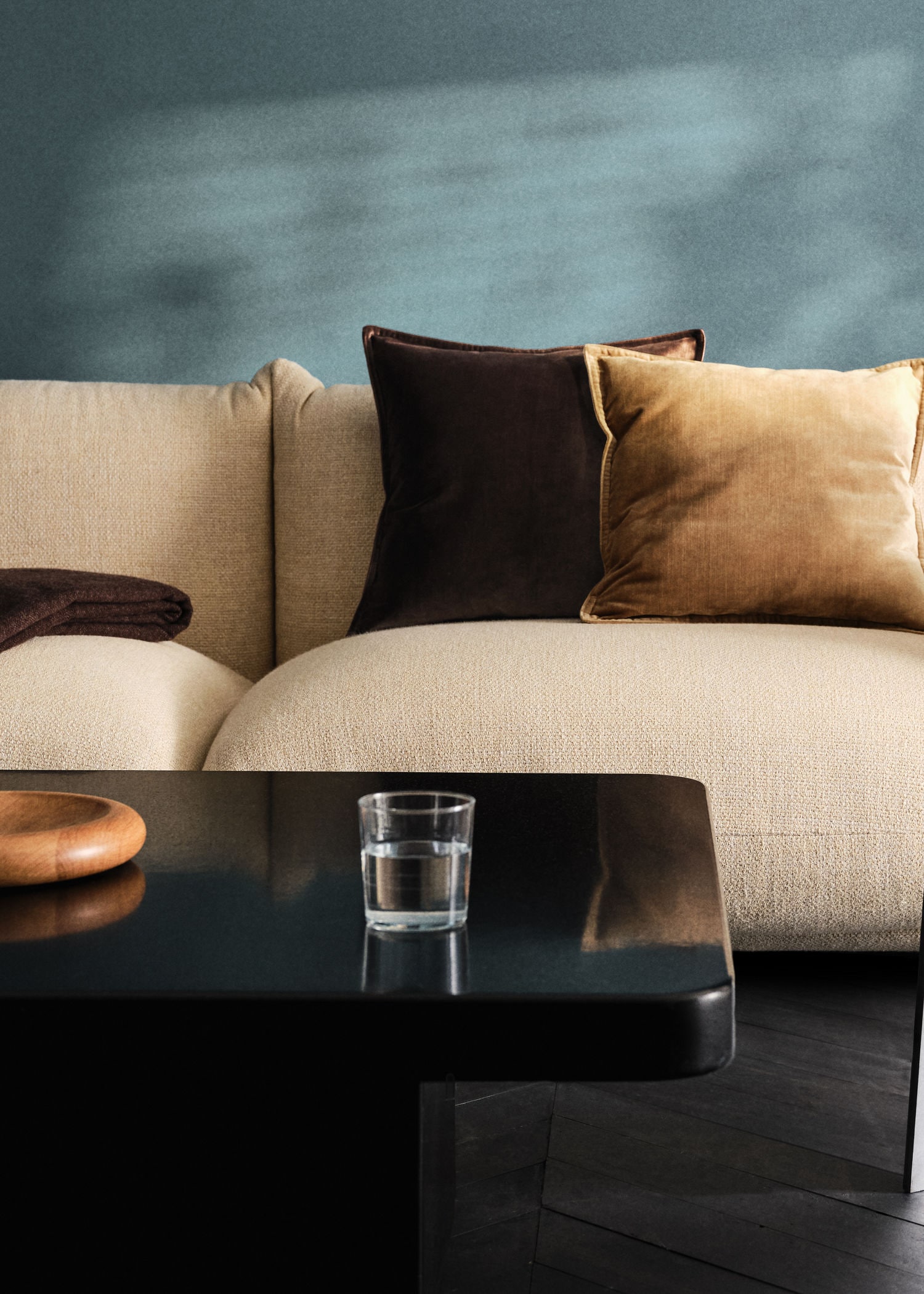 Combine cushions with beige sofa.