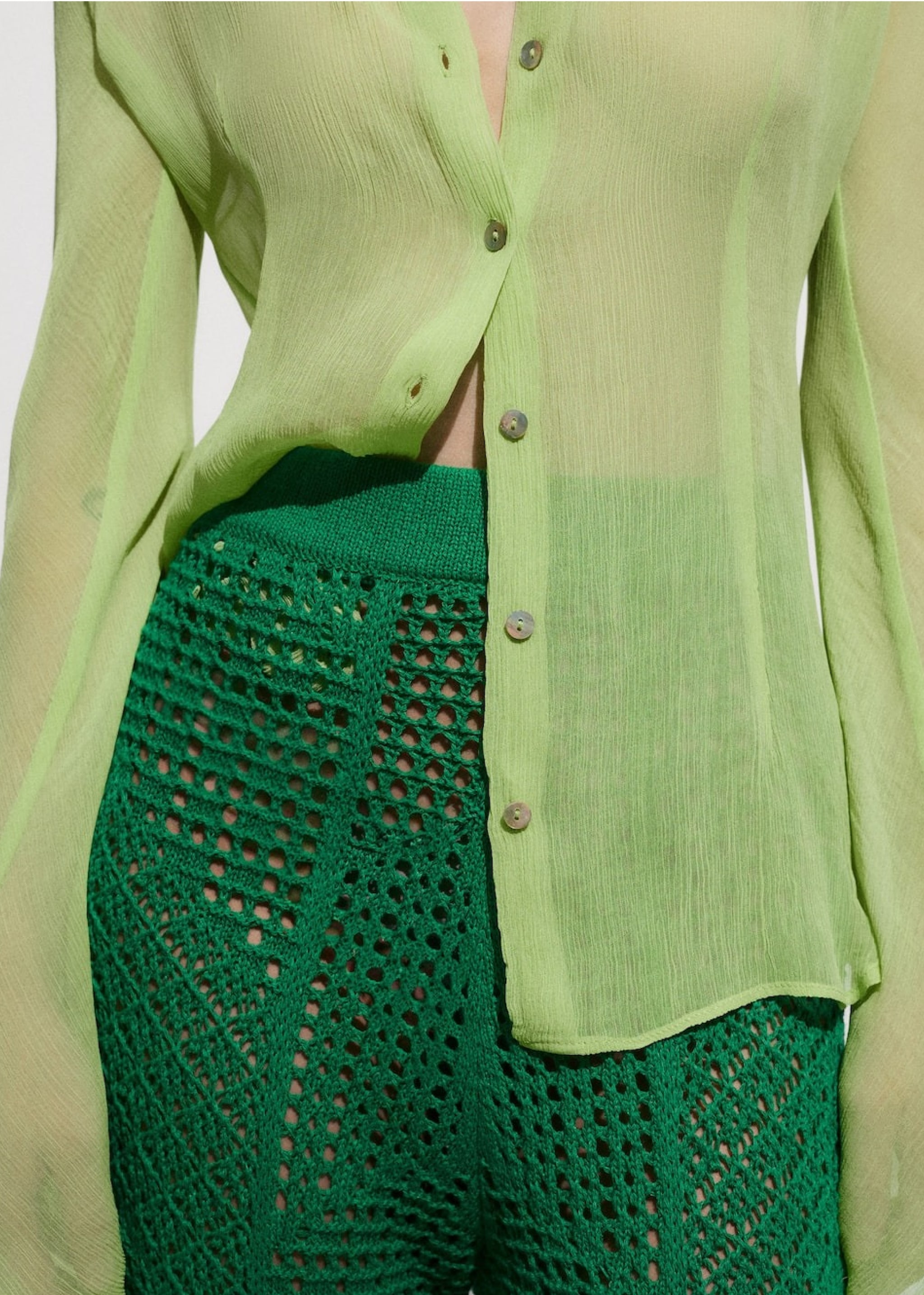 Combine lime green in a total look with shirt and trousers.