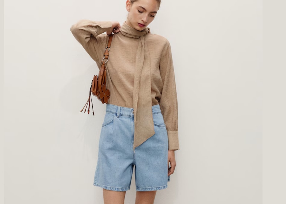 Outfit con bermuda da donna.