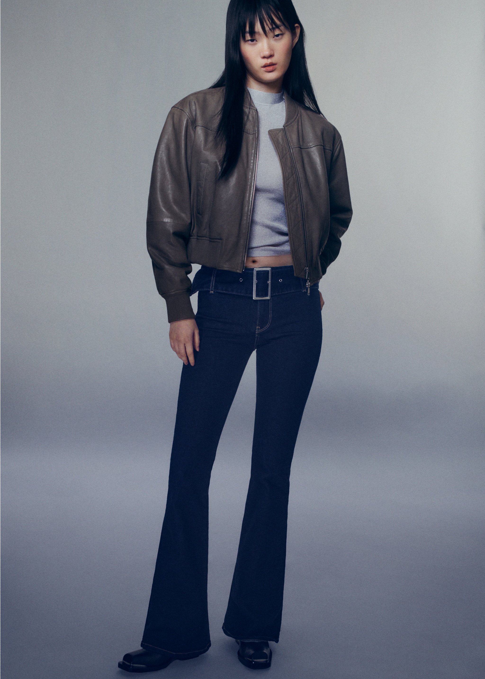 Woman wearing flared jeans